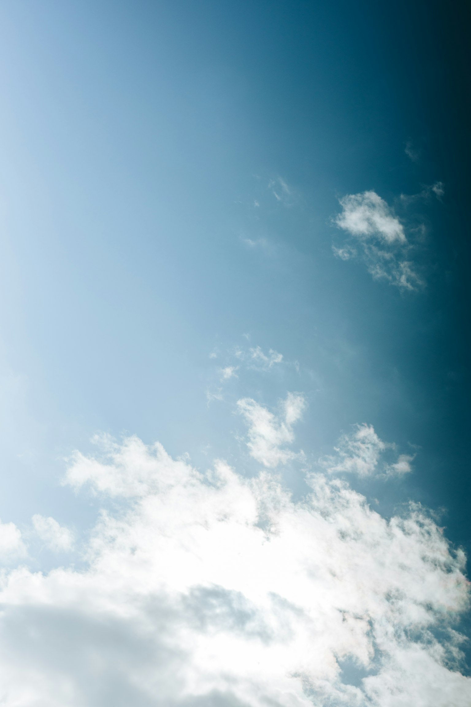 Blue sky with fluffy white clouds