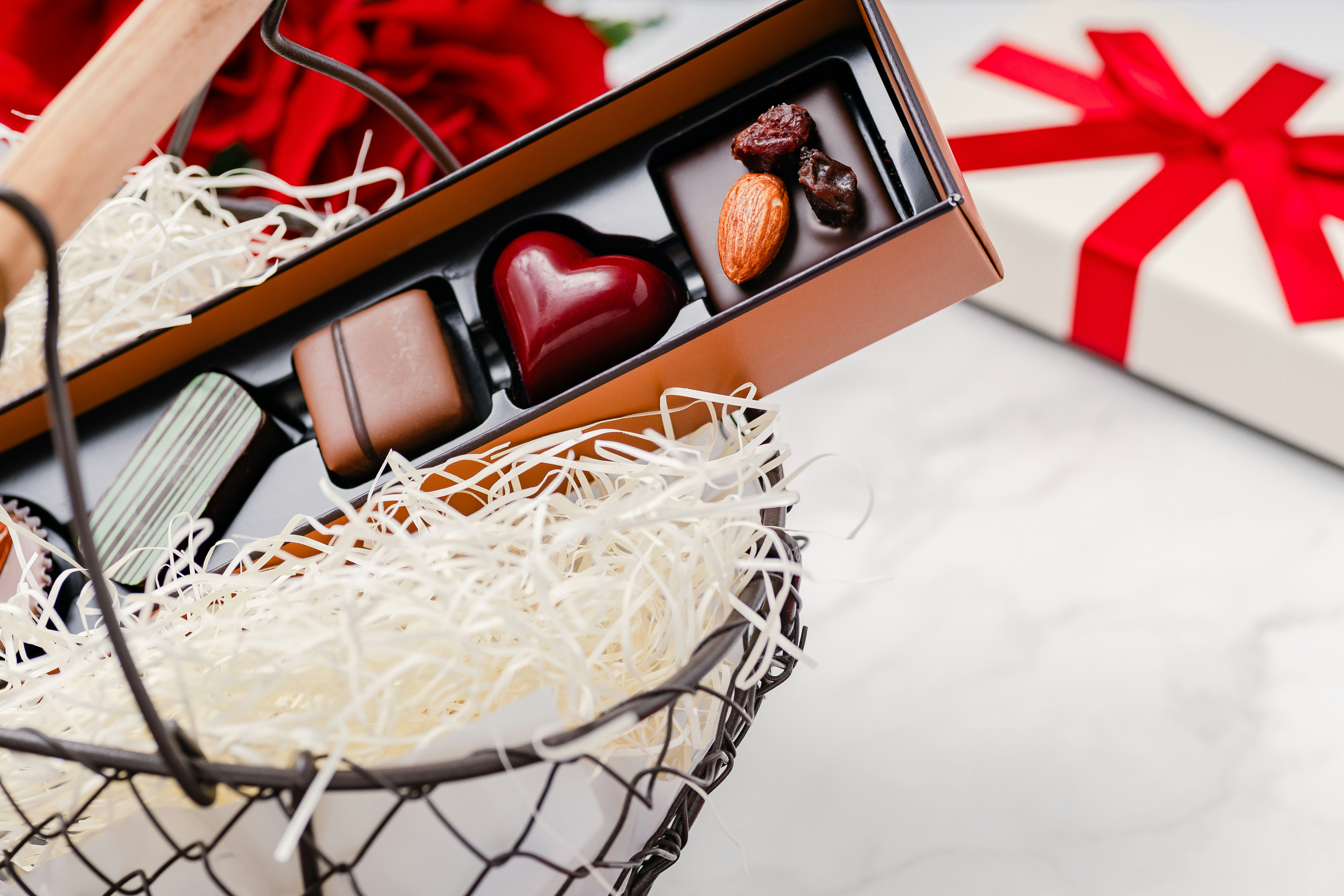 Valentine’s gift box with heart-shaped chocolates and assorted sweets image
