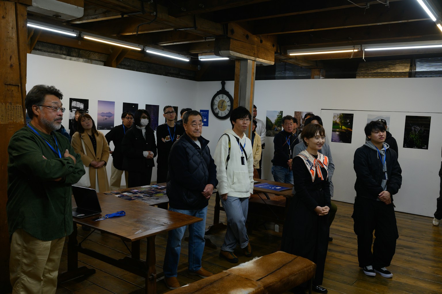Audience observing an art exhibition in a gallery