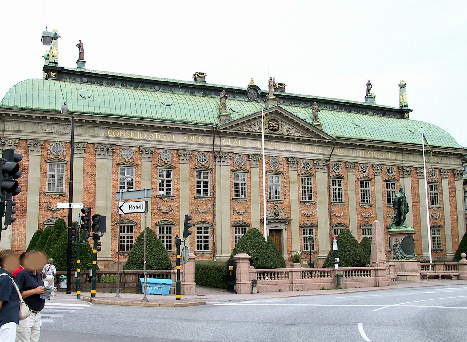 Historical building in Sweden featuring a green roof and decorative sculptures