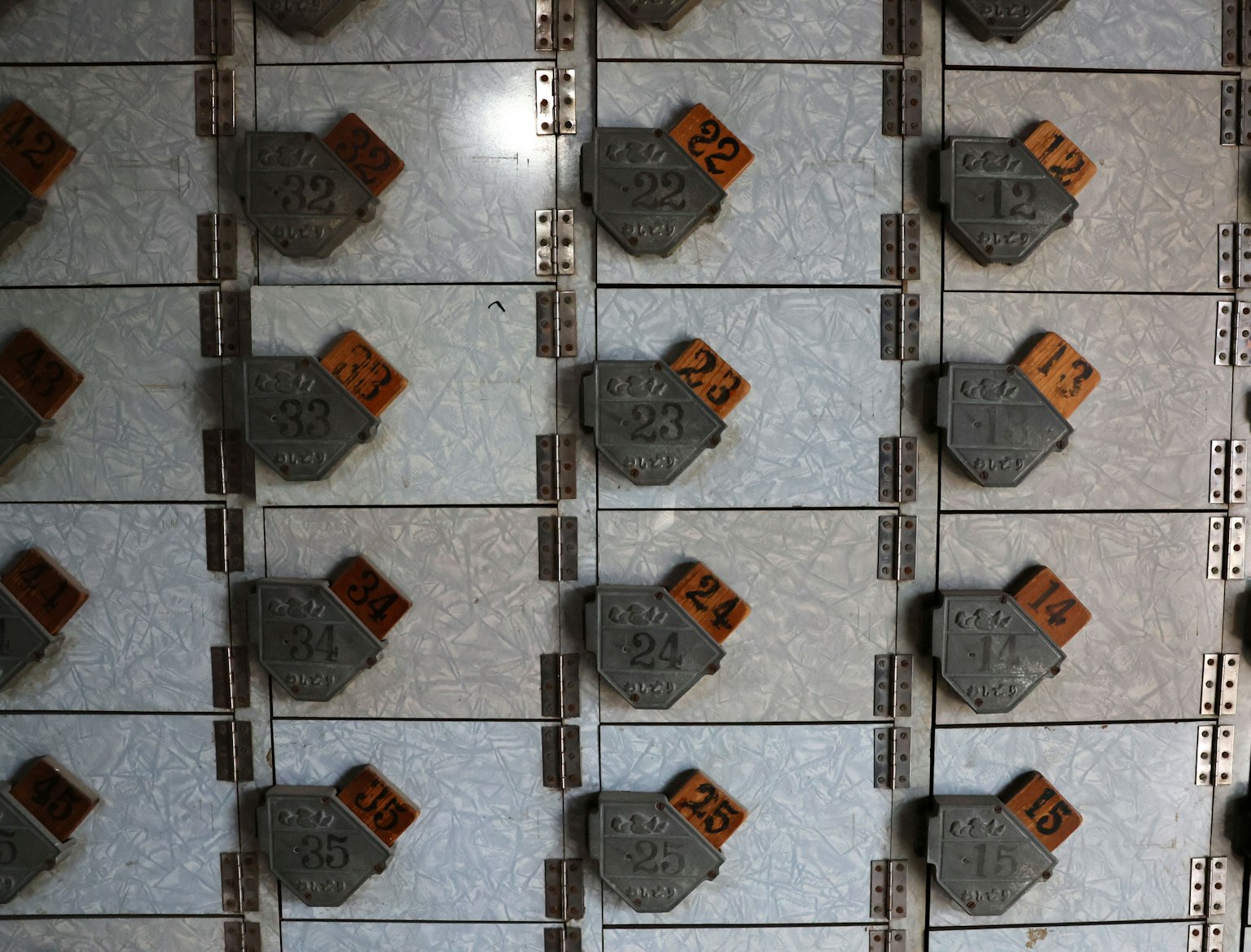 Image of lockers in rows with numbered tags