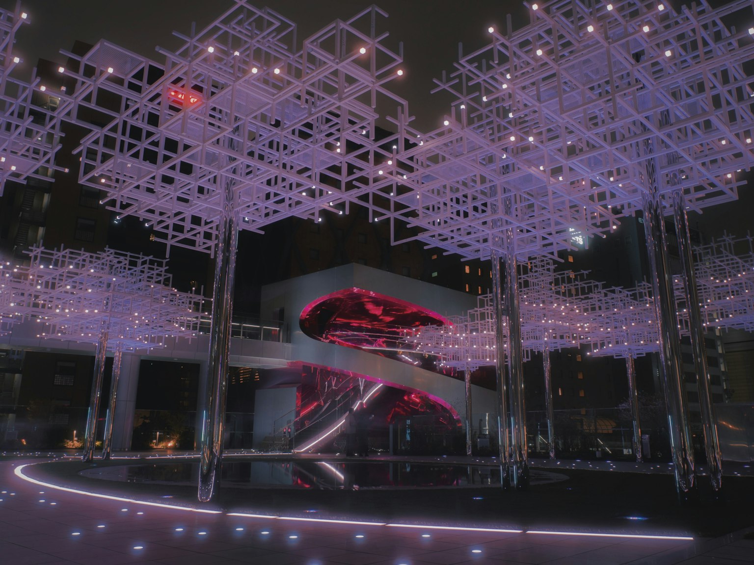 Modern architectural interior featuring glowing lights and unique structures