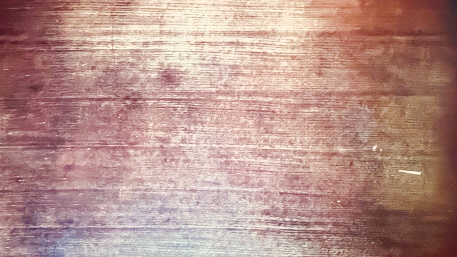 Fond en bois texturé avec des variations de grain et de couleur