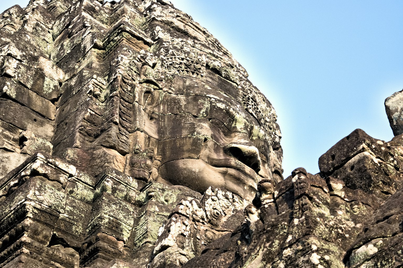 Grande scultura di faccia in pietra di Angkor Wat