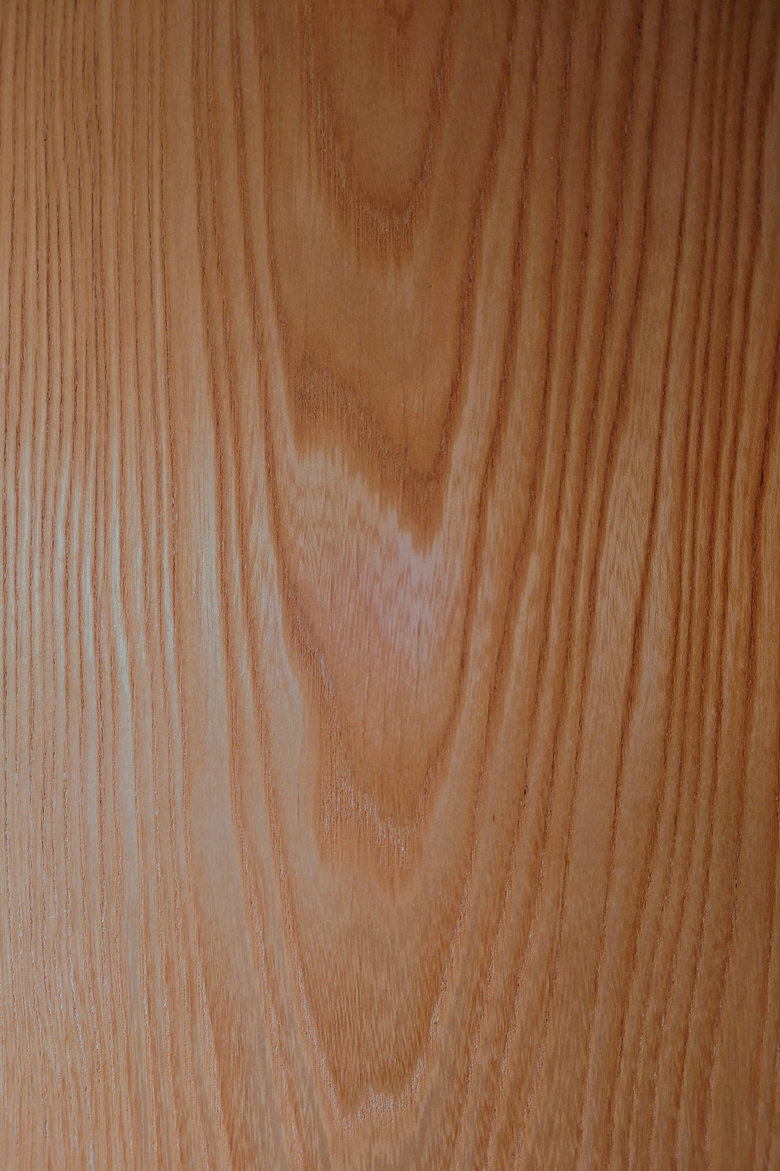 Superficie in legno chiaro con motivi di grano distinti