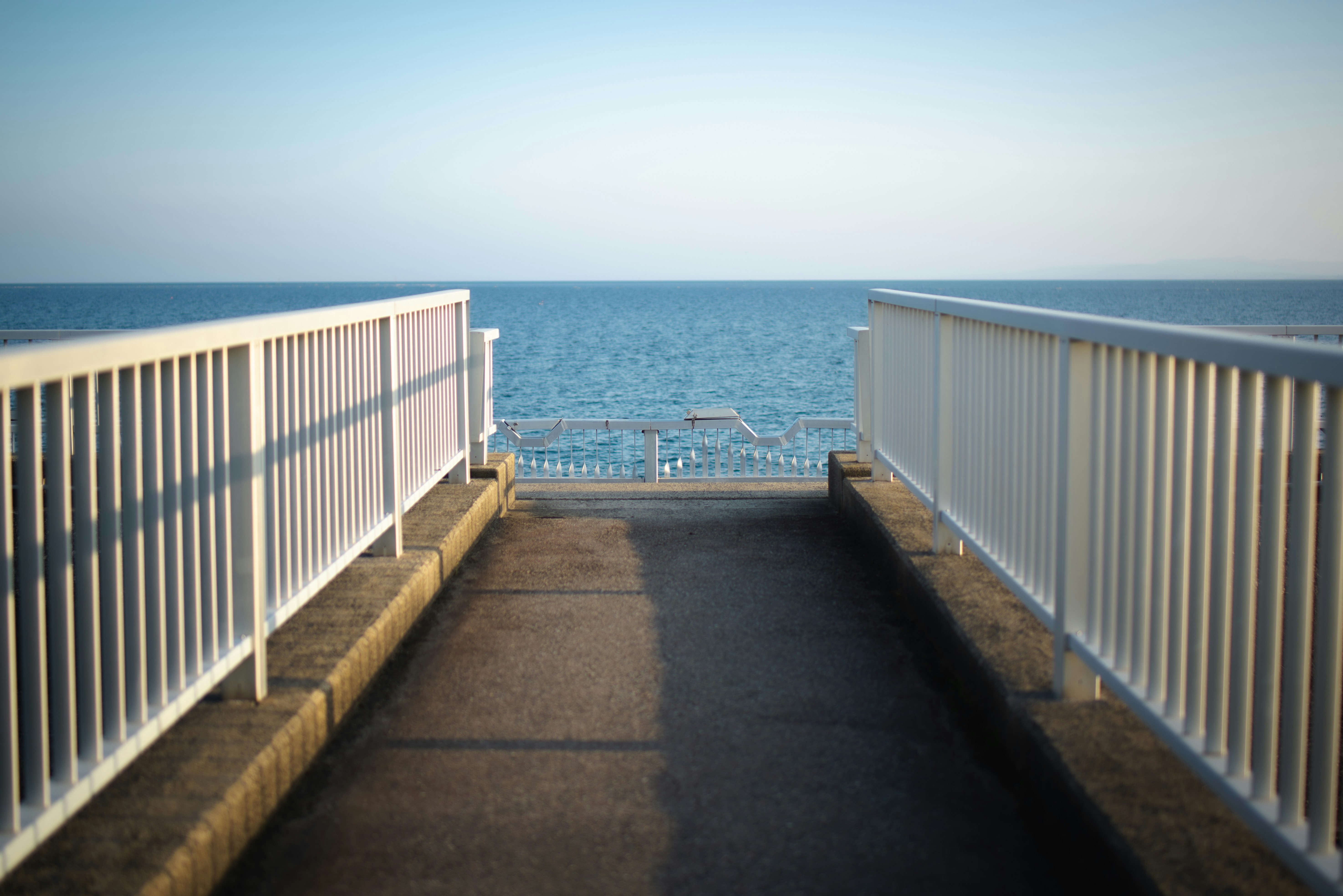 pier walkway leading to the sea