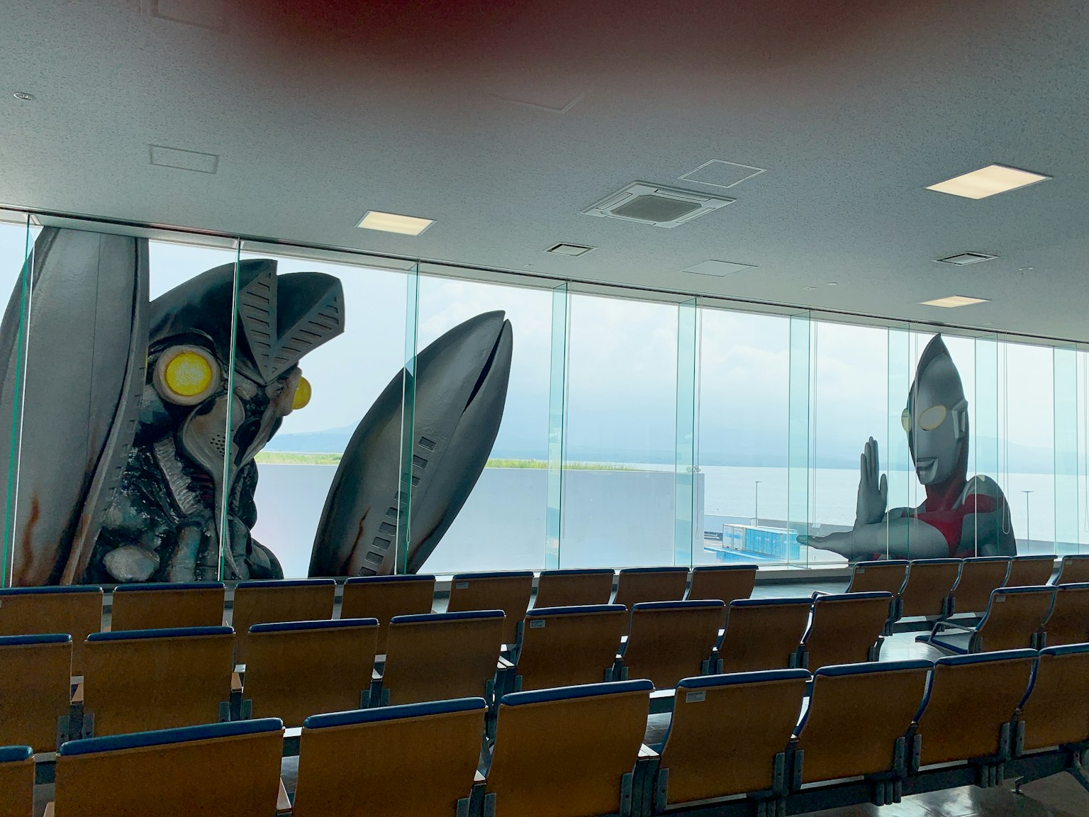Large art installations featuring creatures in an airport lounge