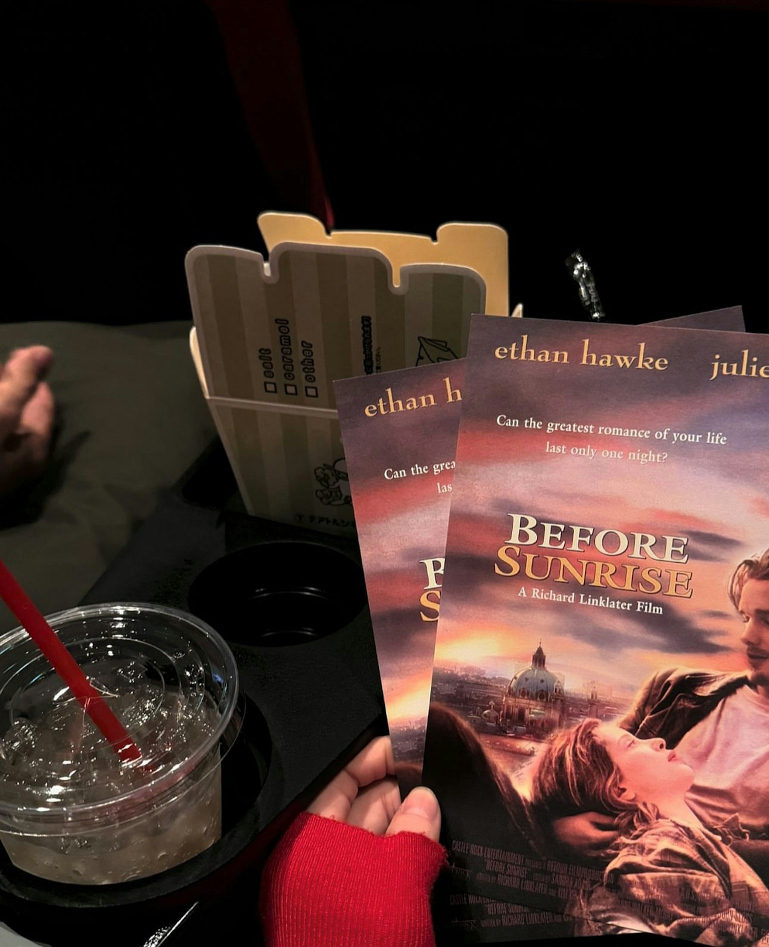 Movie pamphlet for Before Sunrise with a drink on the table