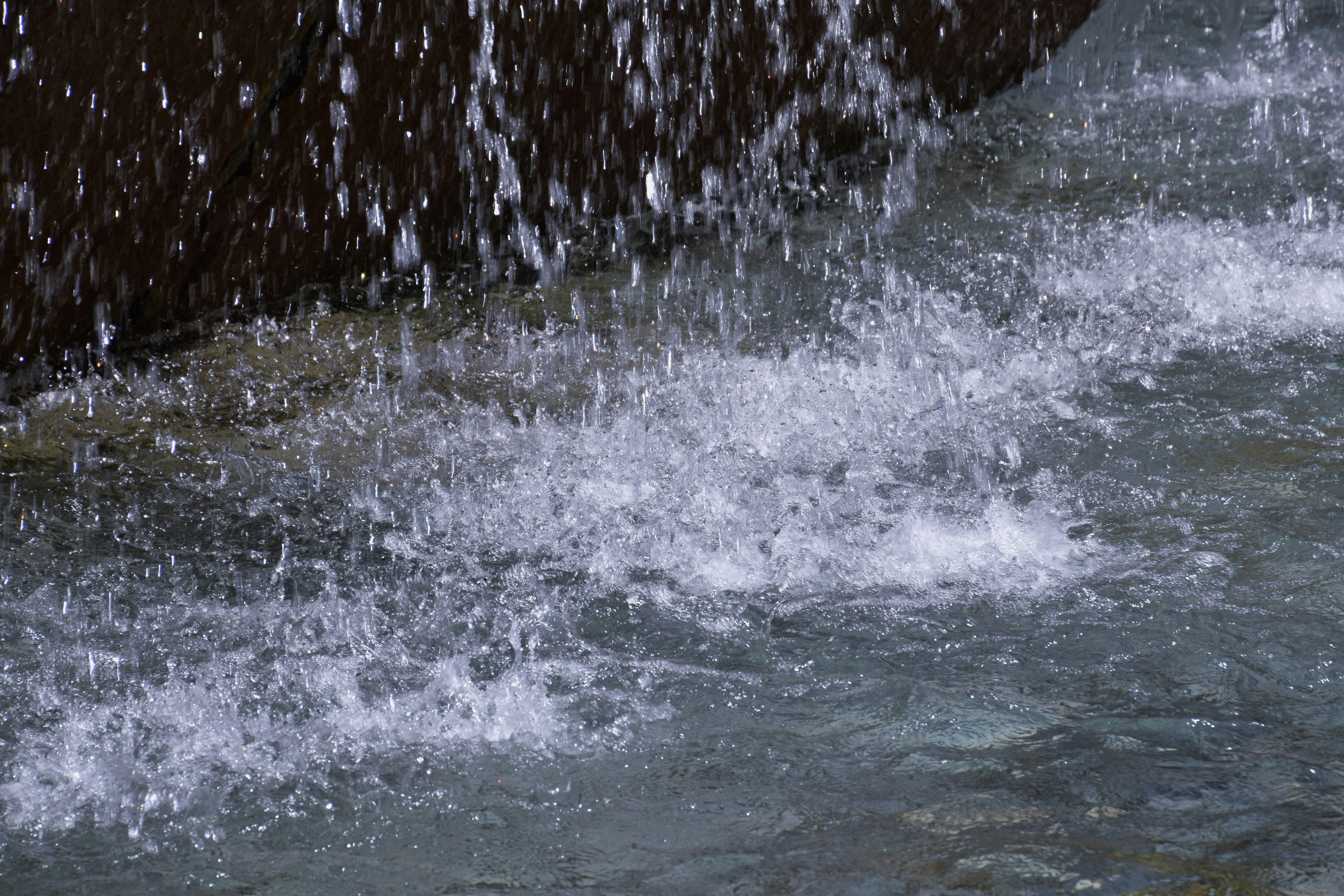 rain splashing into a river current