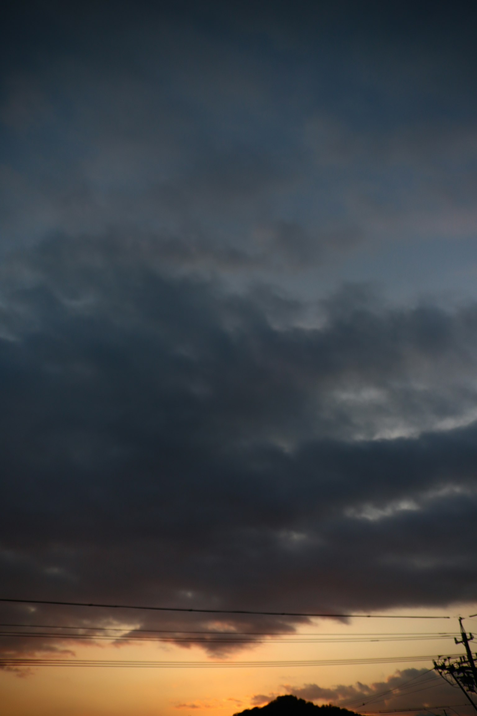 Contrast of sunset sky and dark clouds