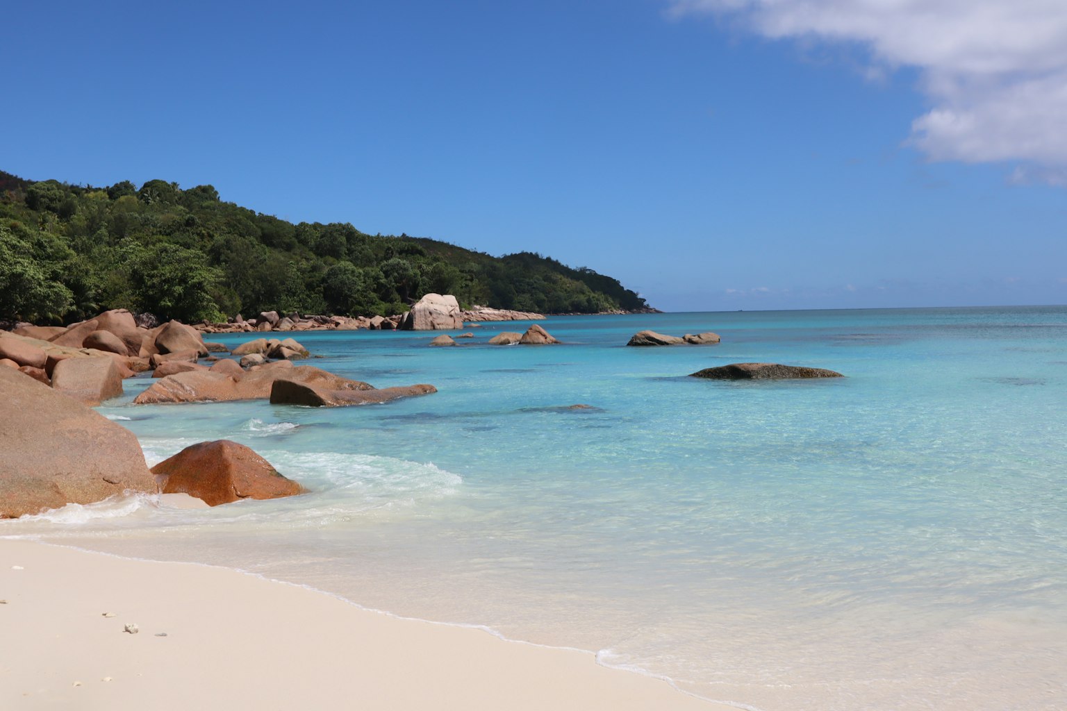 Beautiful beach scene with blue sea and white sand