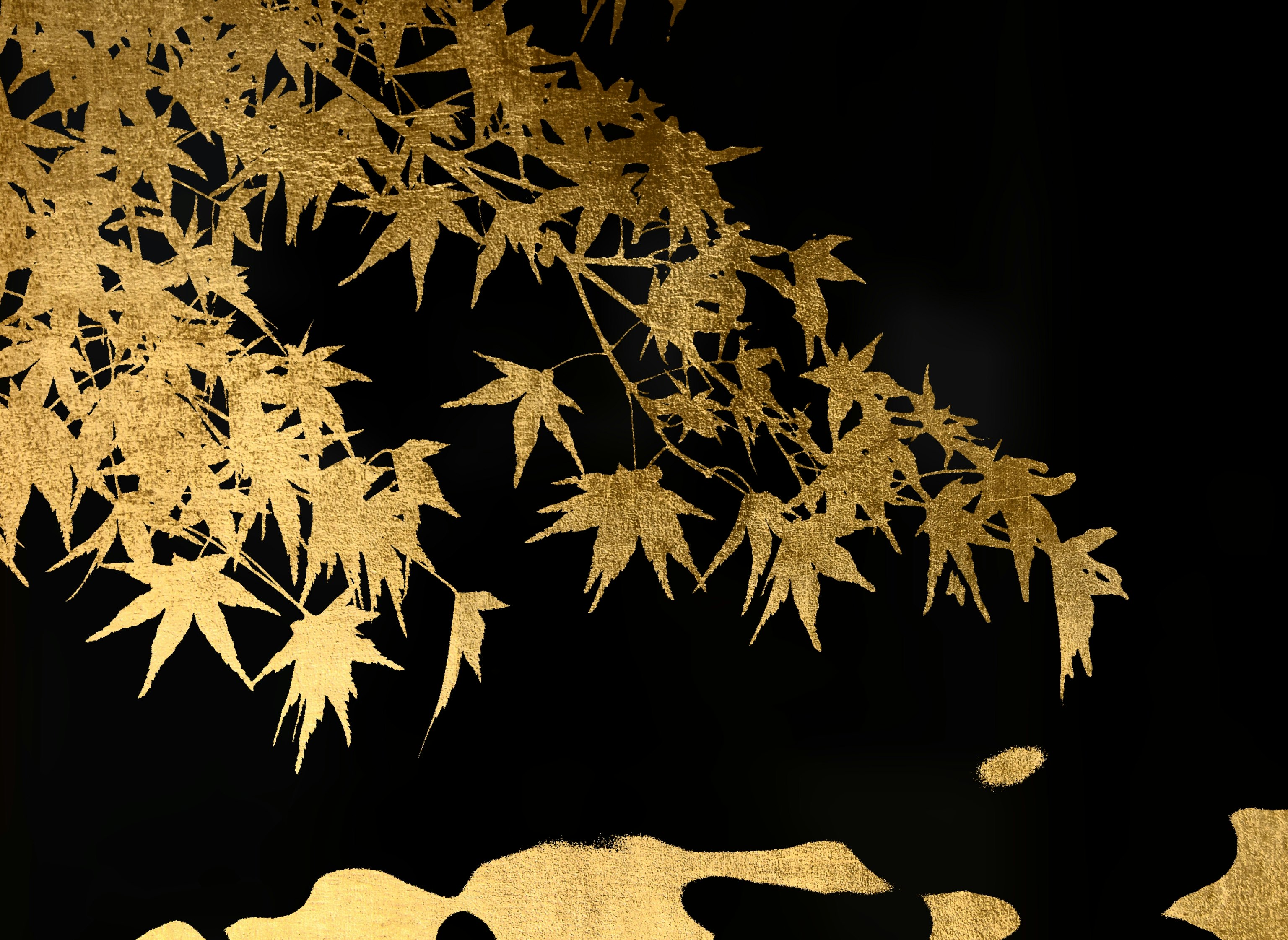 golden maple leaves scattered against a dark background