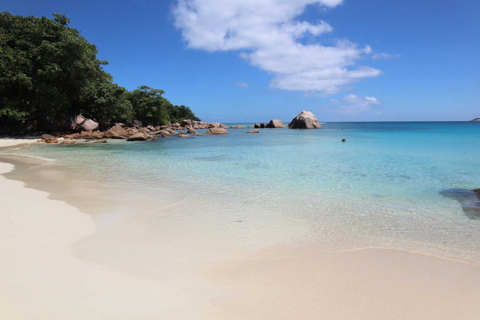 Beautiful beach scene with blue sea and white sand