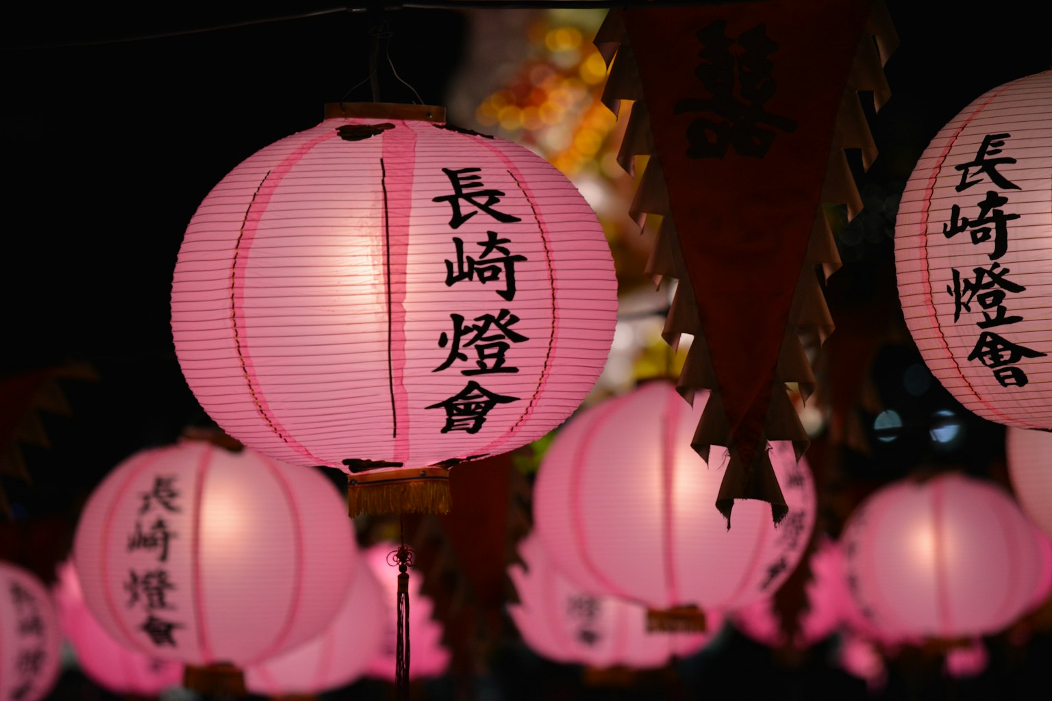 Pink lanterns illuminating the night showcasing Nagasaki Lantern Festival