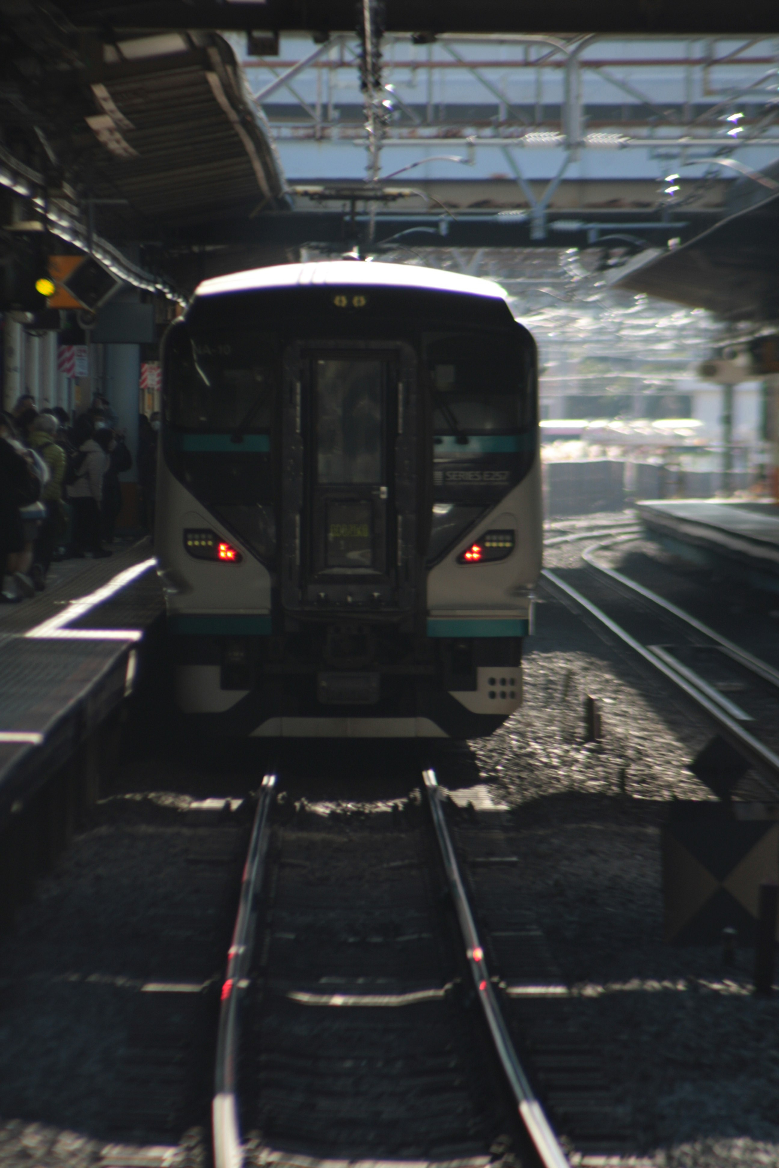 front of a train stopped at a station platform
