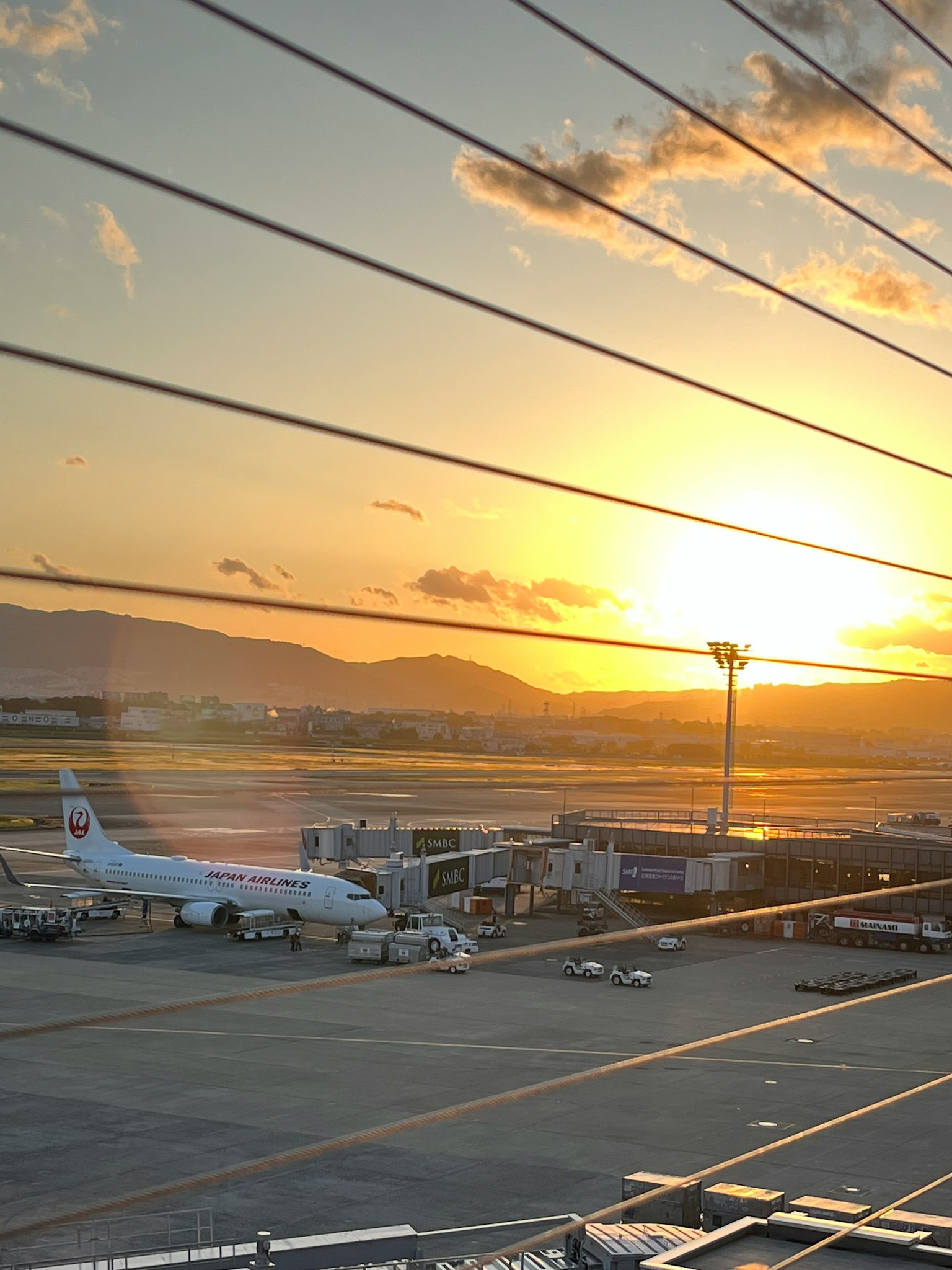 Airport sunset view with airplane