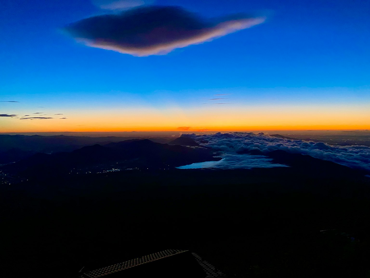 Stunning sunset sky with clouds and mountains