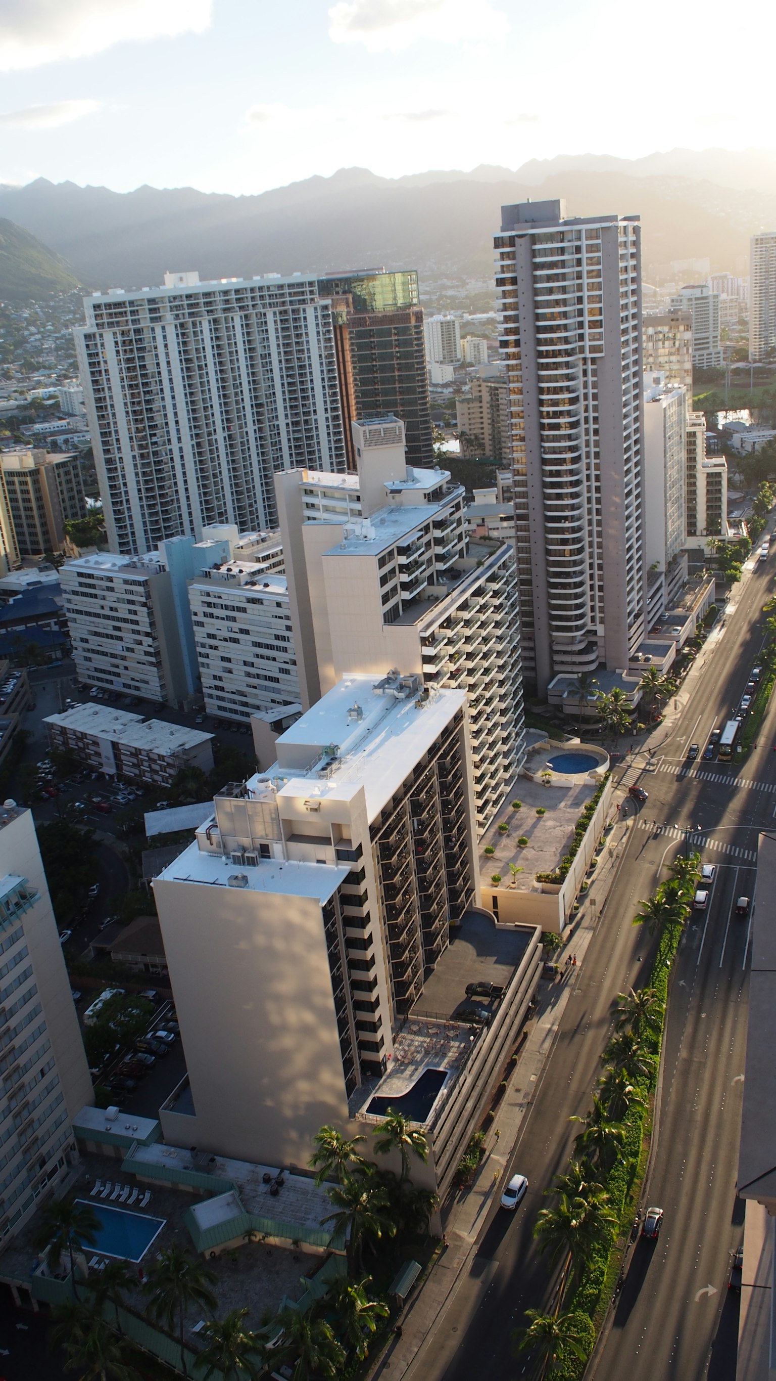 Aerial view of high-rise buildings and road in Honolulu