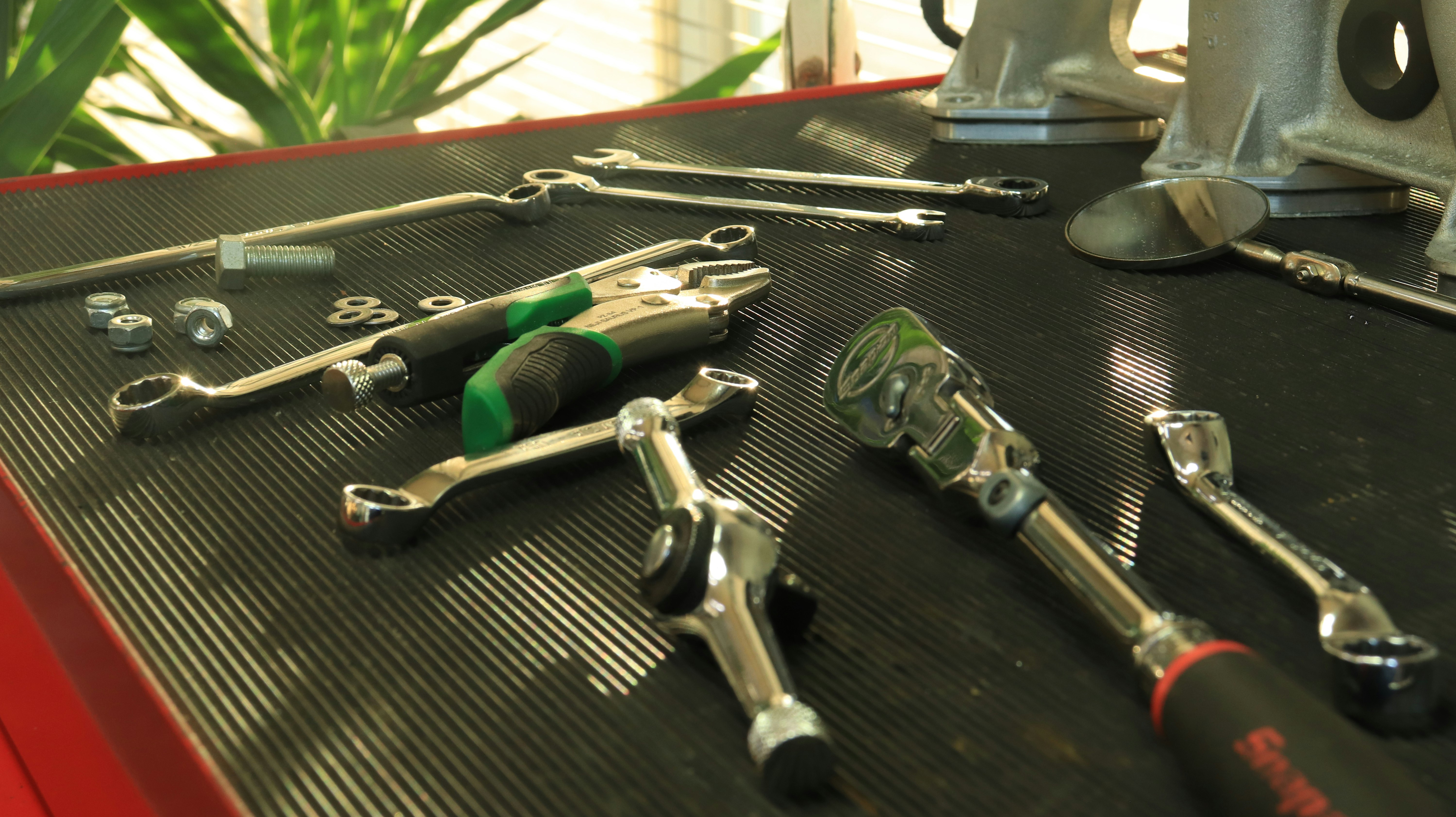 close-up of tools laid out on a workbench