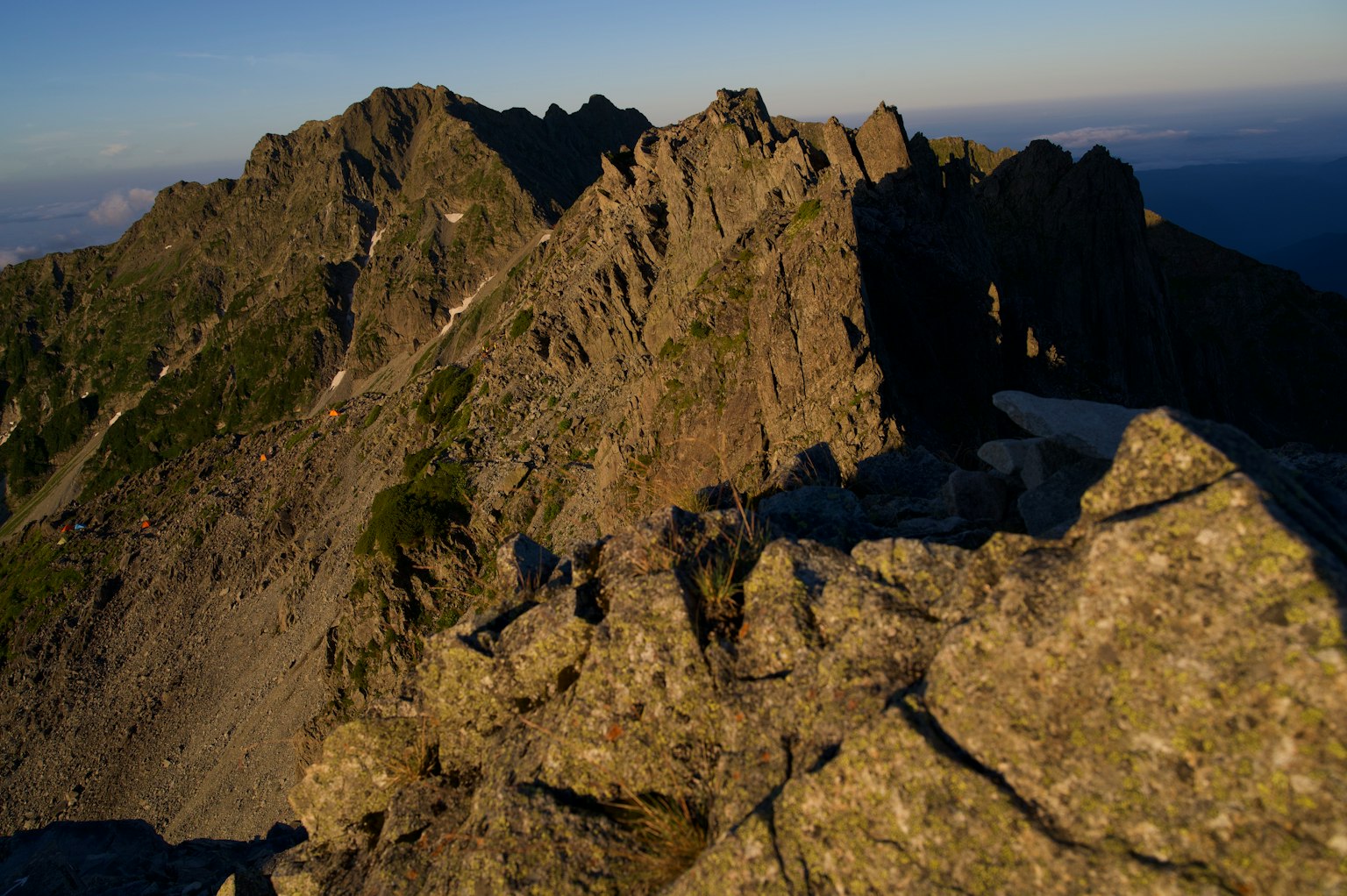 Scenic view of rocky mountain peak with rugged terrain