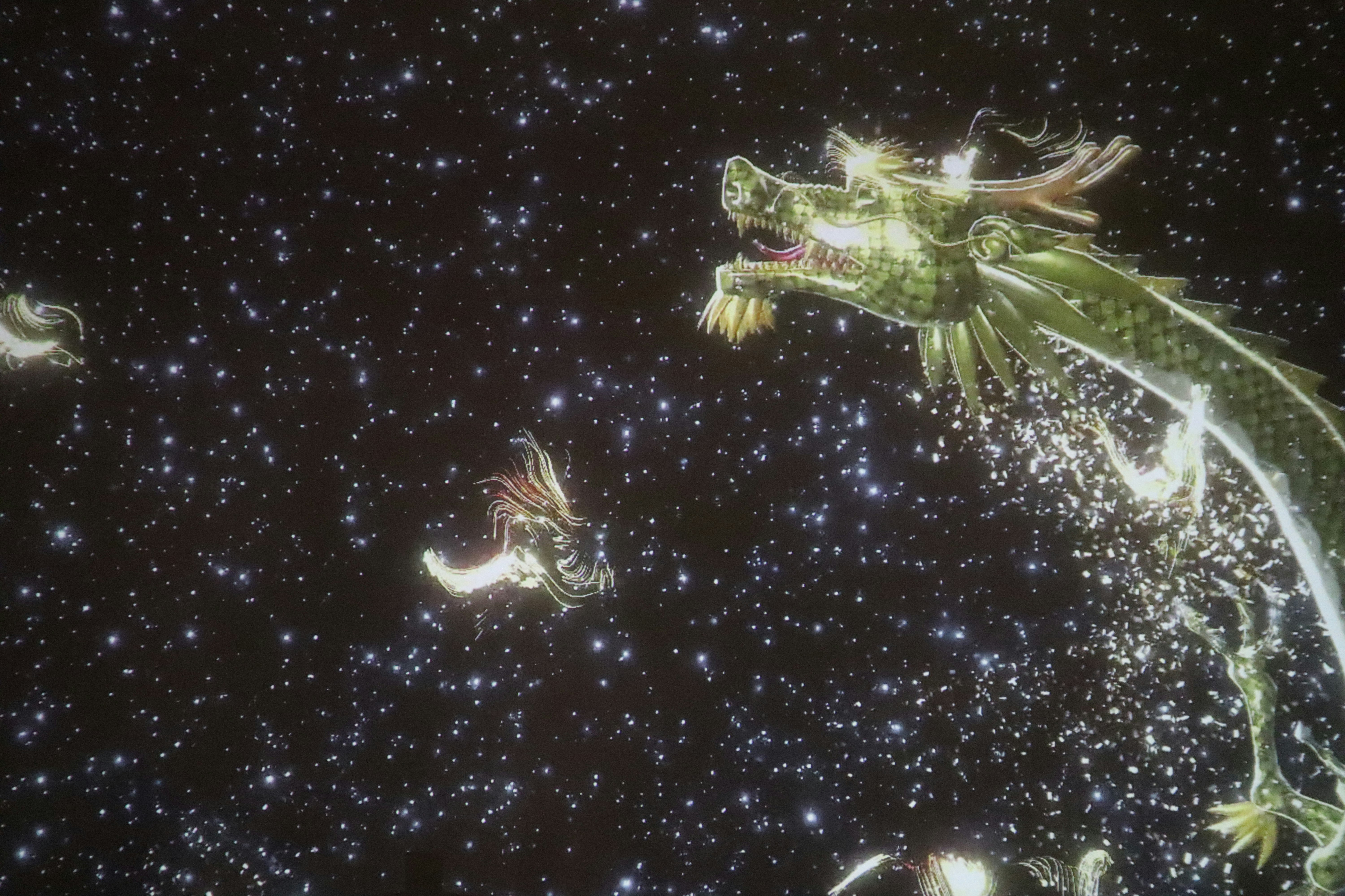glowing dragon flying through a starry sky with magical trails
