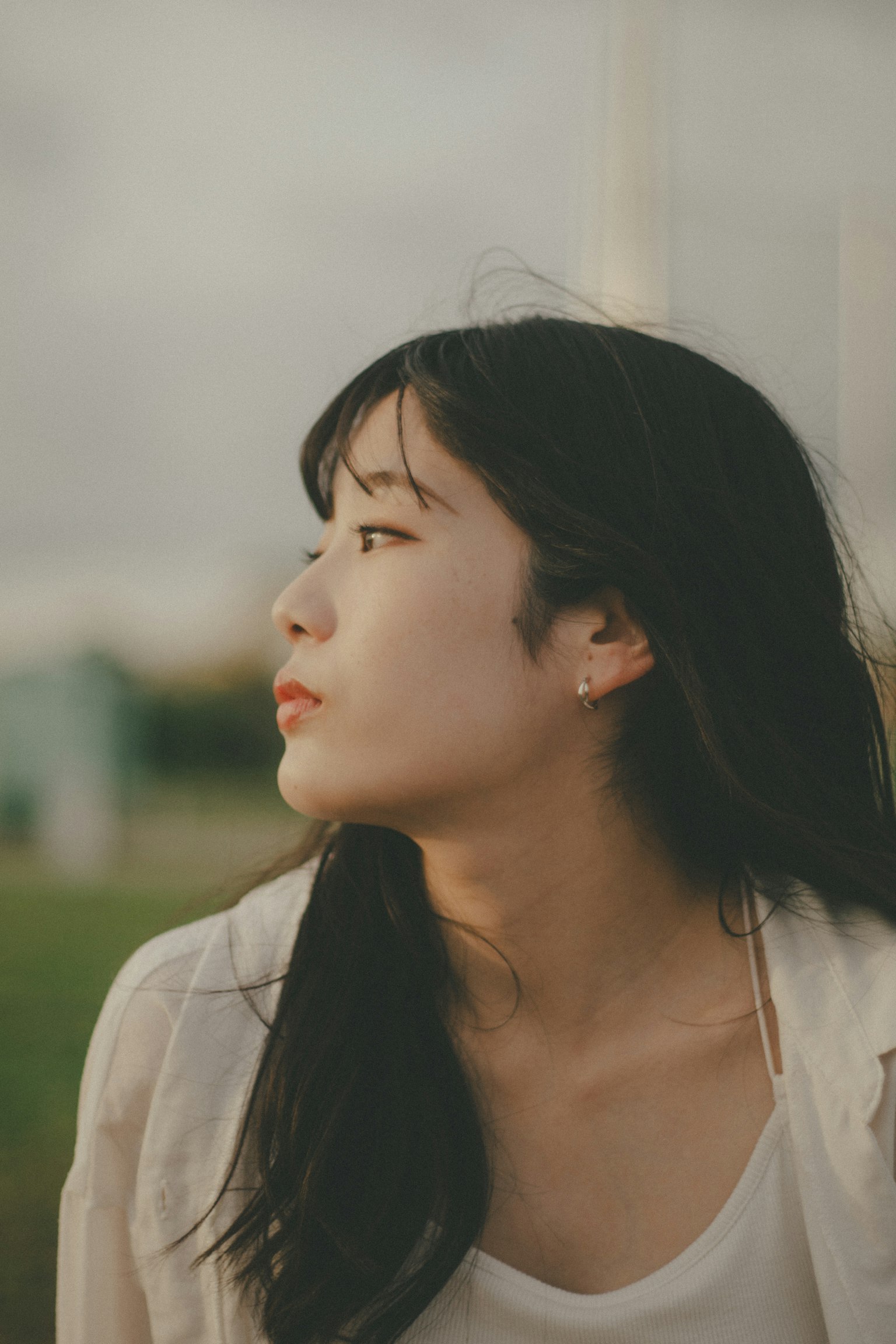 Portrait of a woman looking sideways captured in natural light