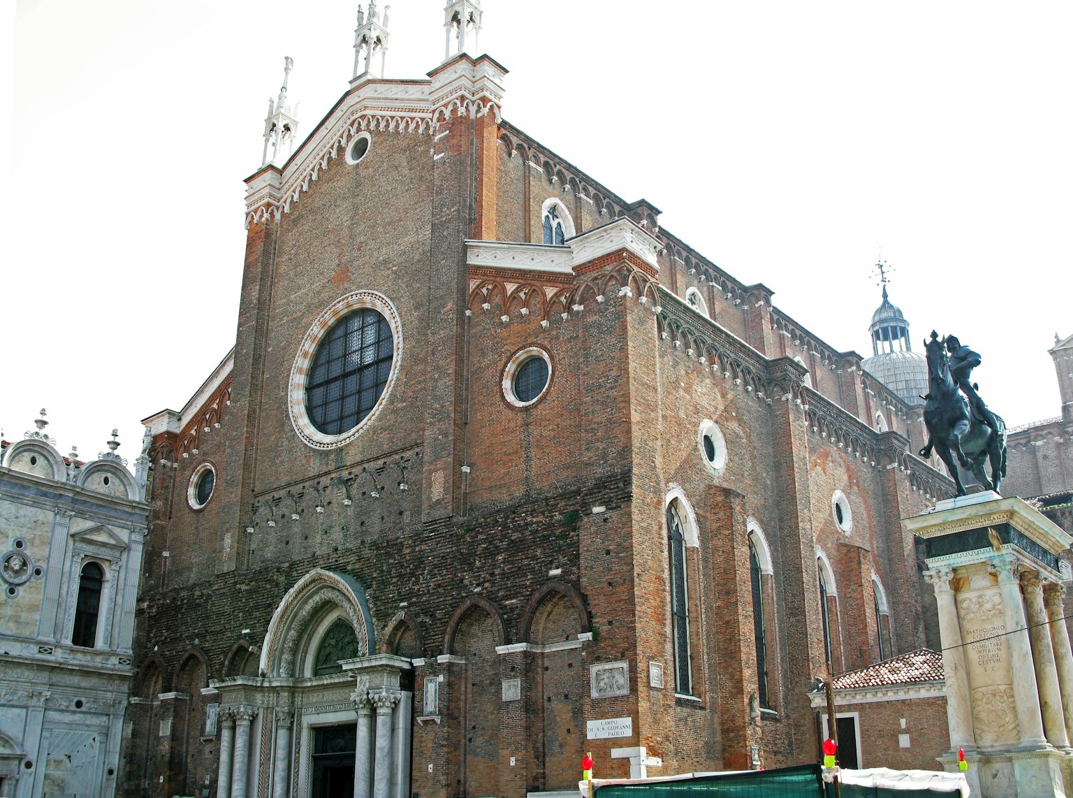 Historic building exterior featuring beautiful arches and decorative details