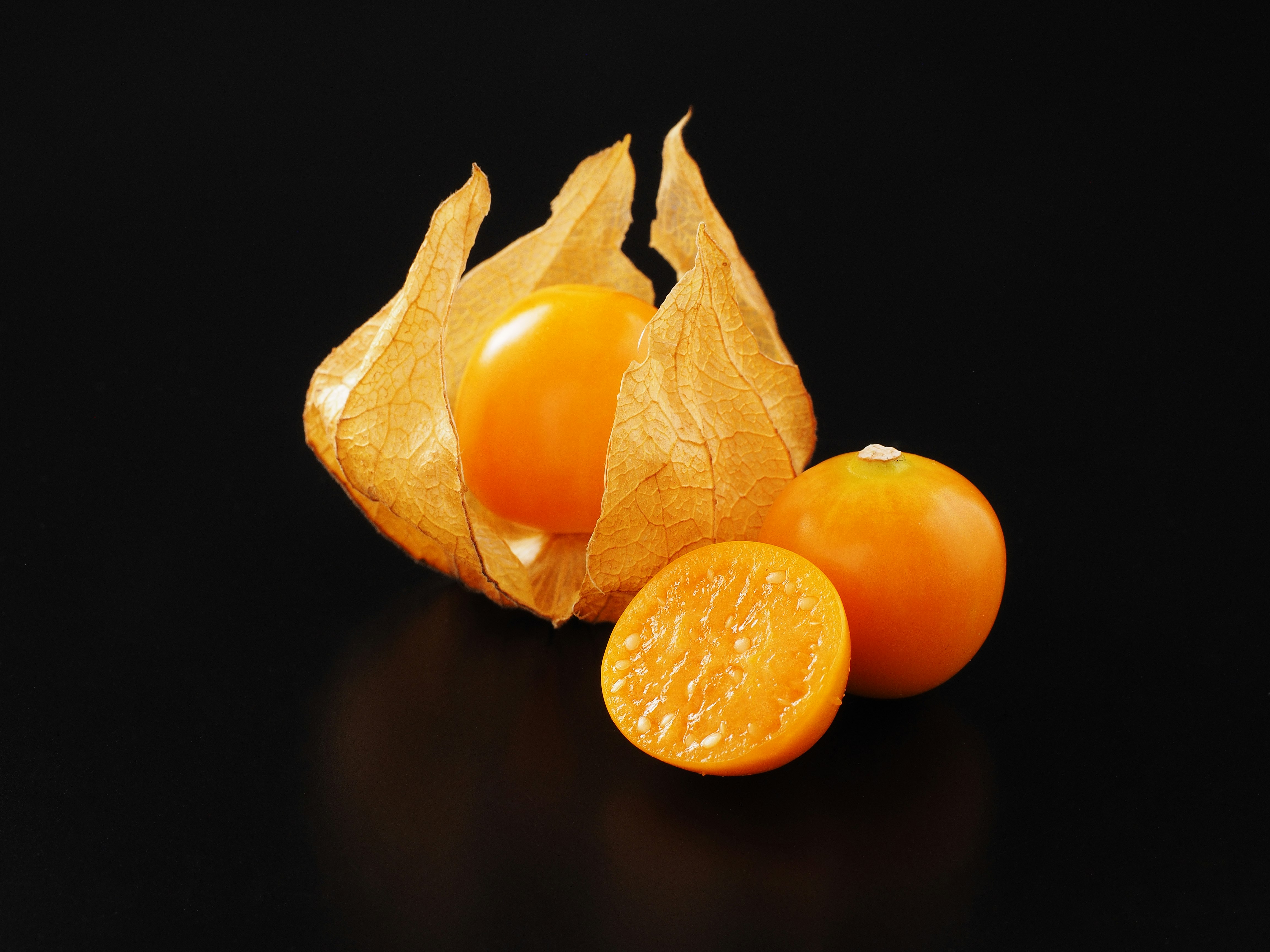 橙色蜡烛与橙子果实