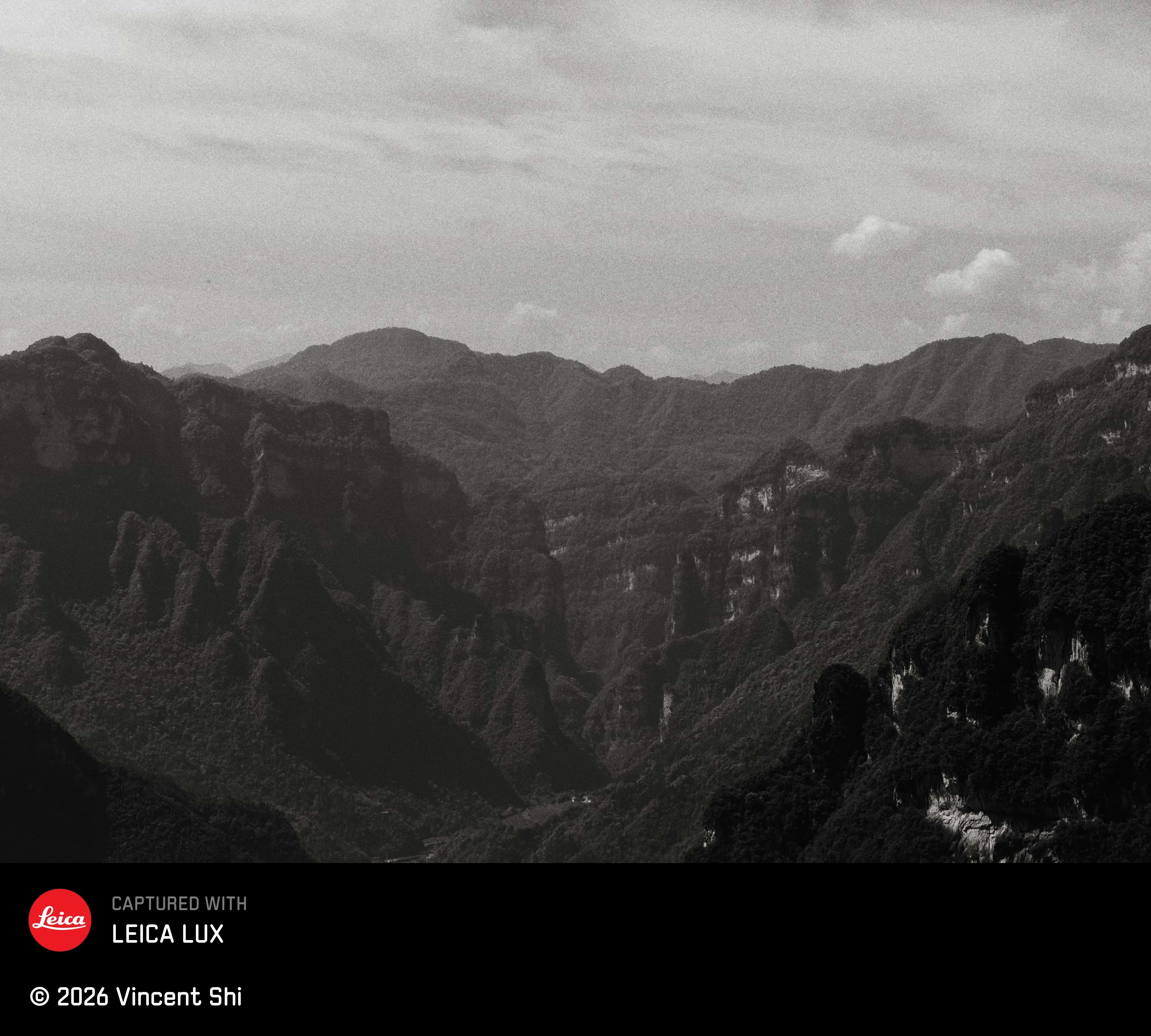 misty mountain valley view with layered ridgelines