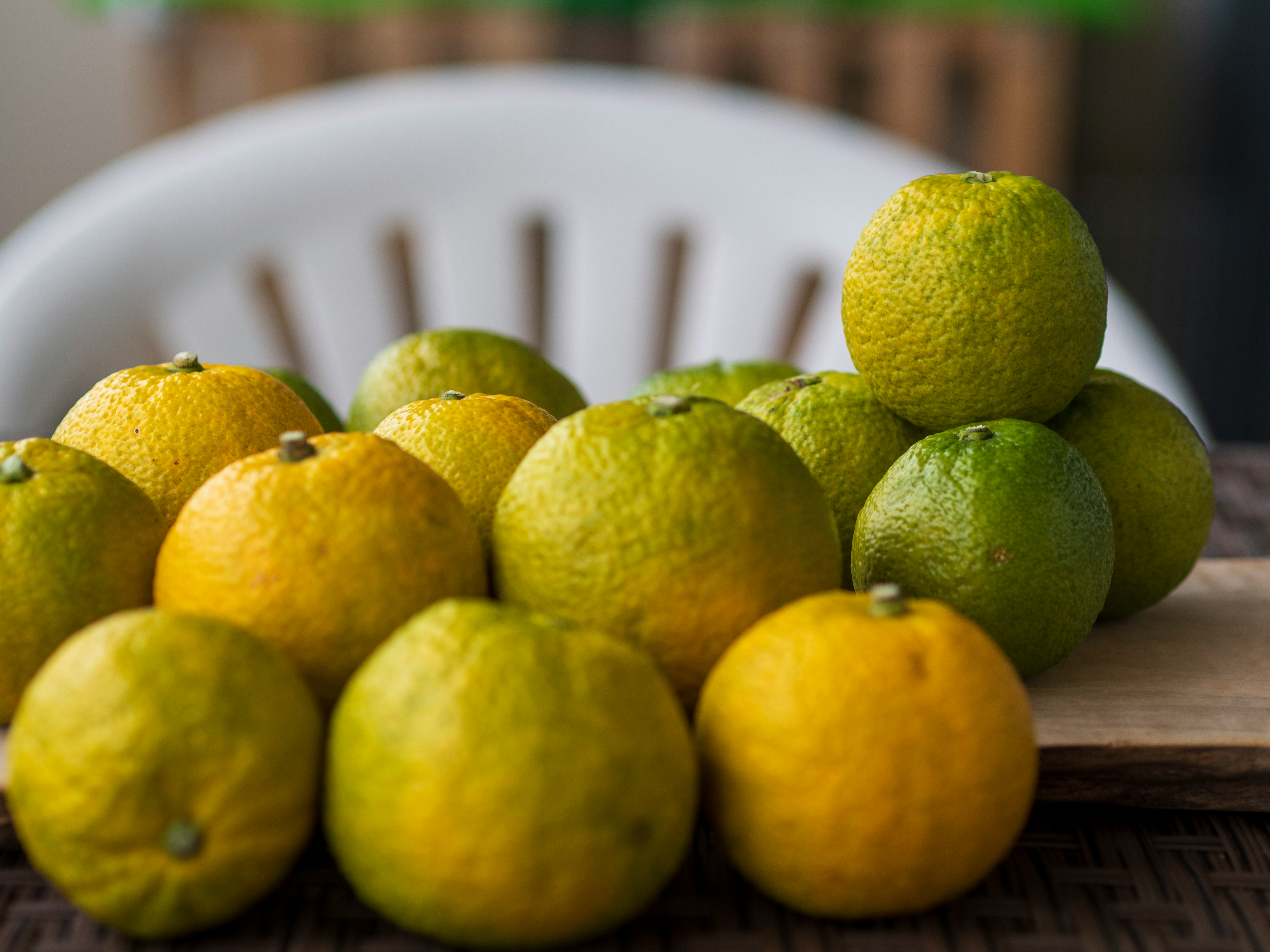 citrus fruits piled on a plate