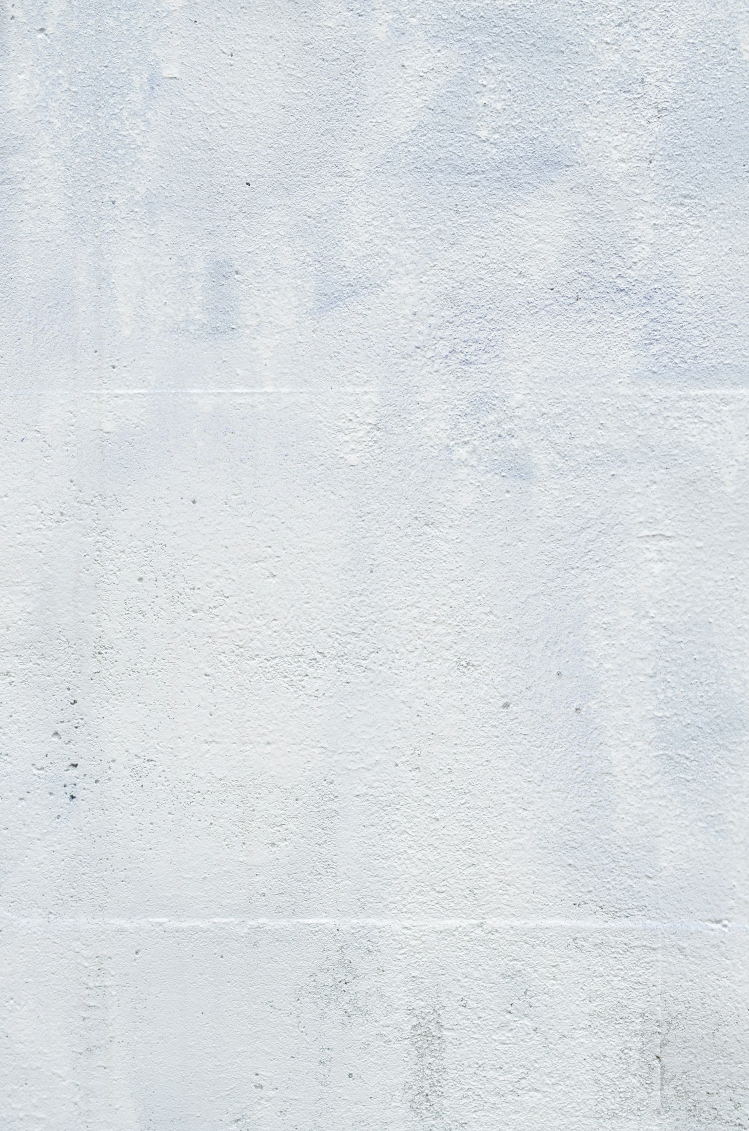 Muro bianco texturizzato con sfumature sottili