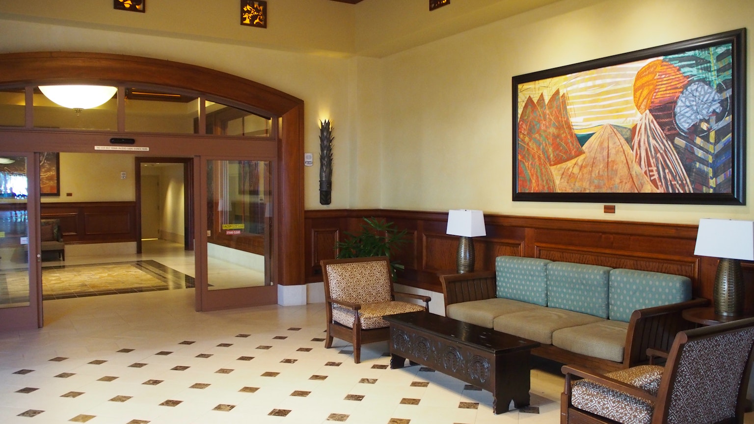 Bright lobby area featuring furniture and artwork