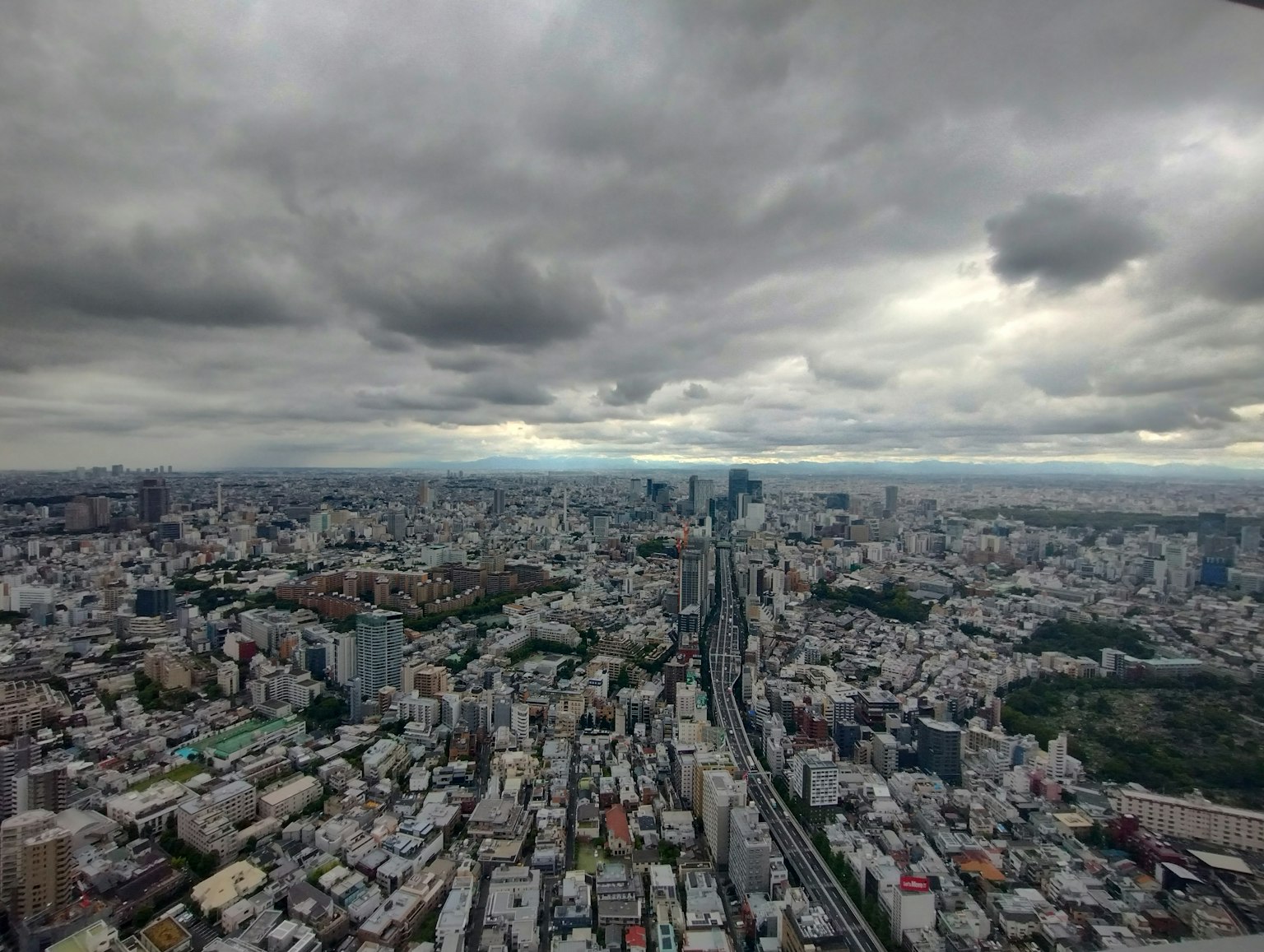 Vista aerea di Tokyo che mostra grattacieli e paesaggio urbano