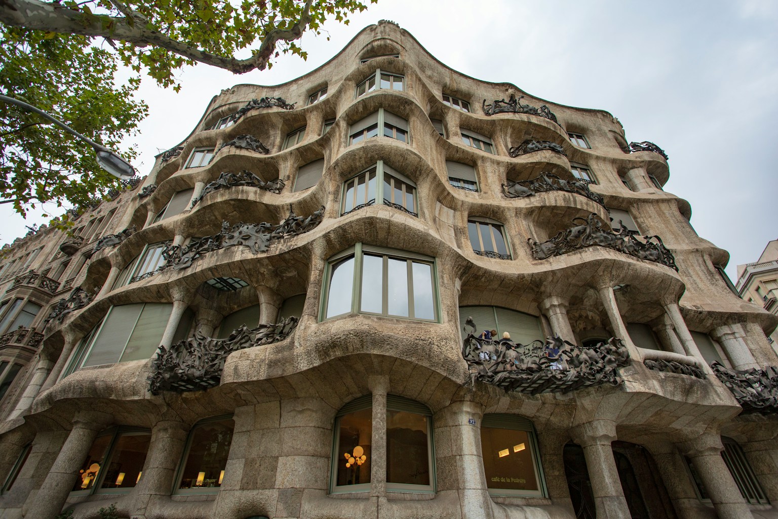 Image capturing the unique curves and sculptural facade of Casa Milà