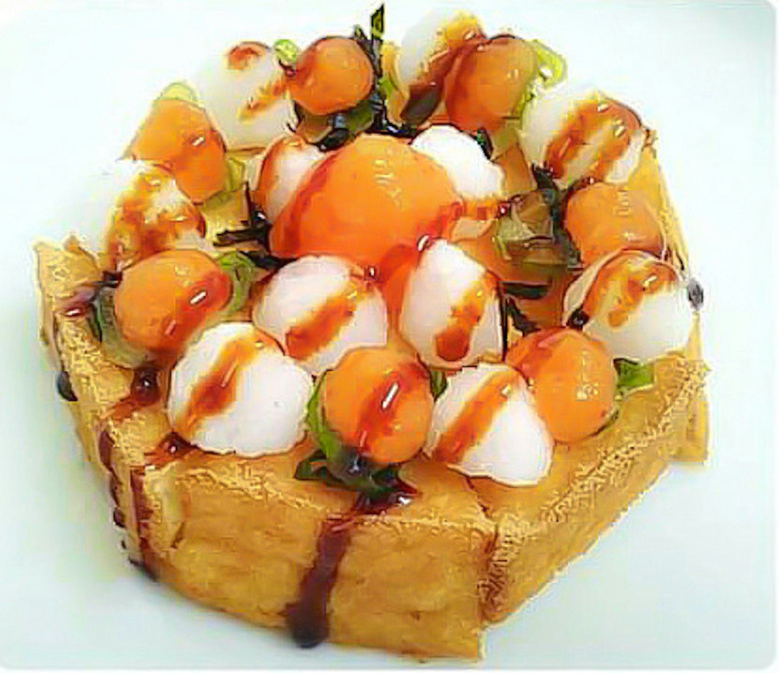 Dessert guarnito con tuorlo d'uovo e mini palline di riso