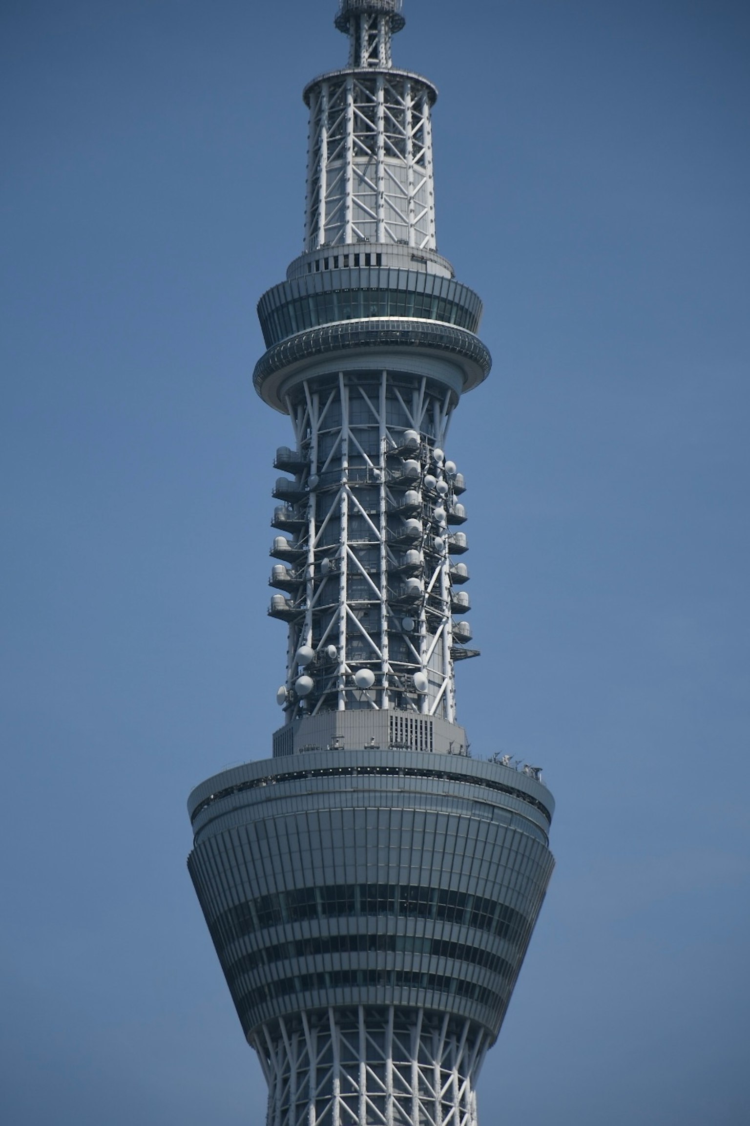 Close-up view of Tokyo Skytree showing its upper section