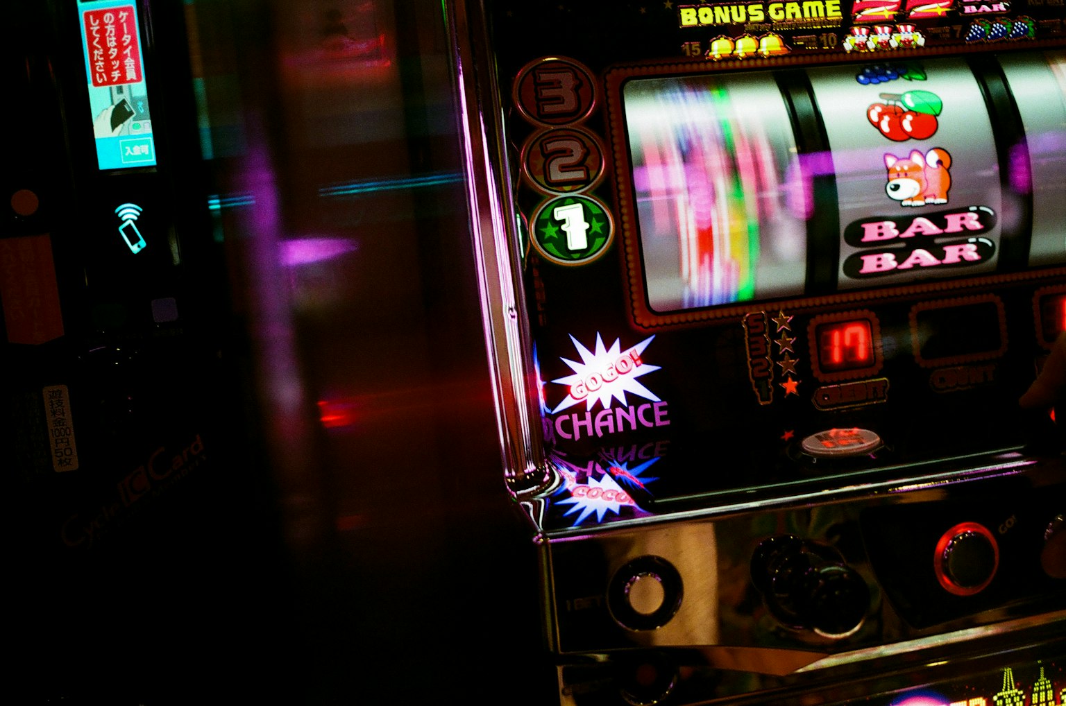 Colorful lights reflecting on a slot machine display