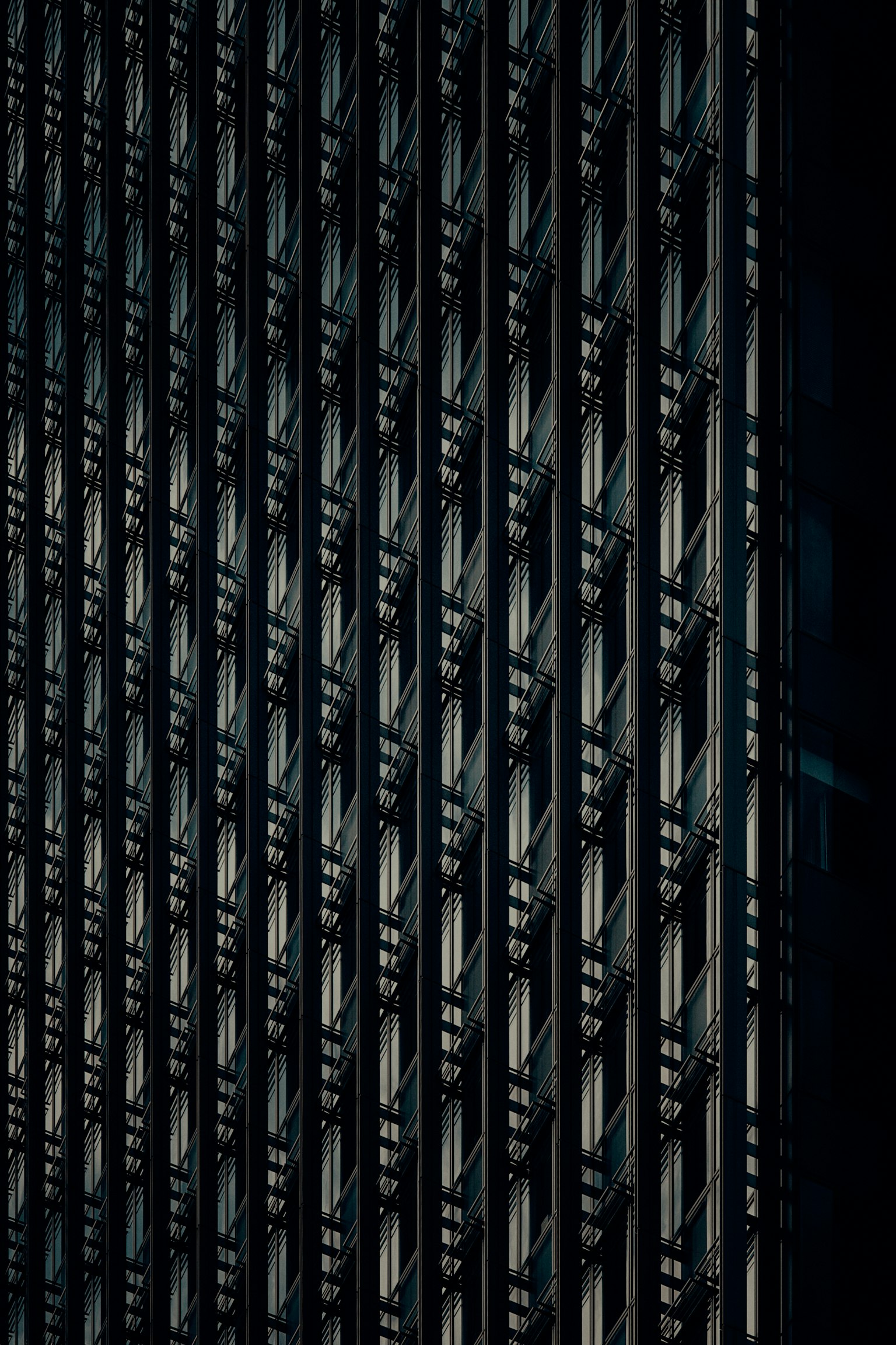 Building exterior with distinctive black vertical stripes