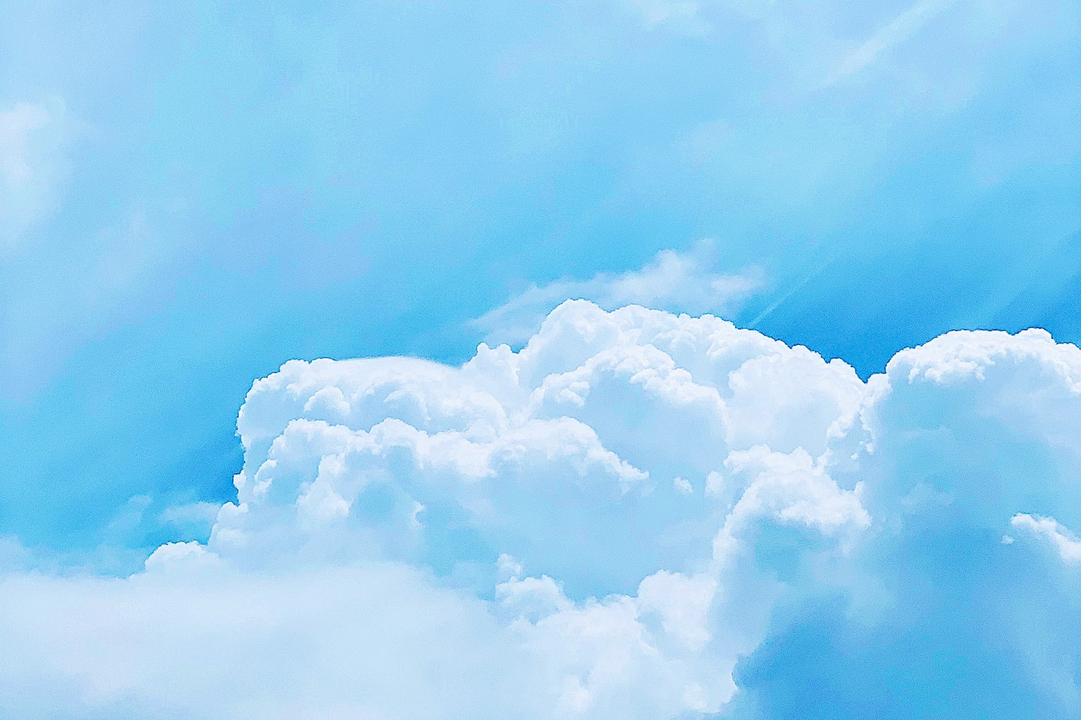 Beautiful view of blue sky with fluffy white clouds