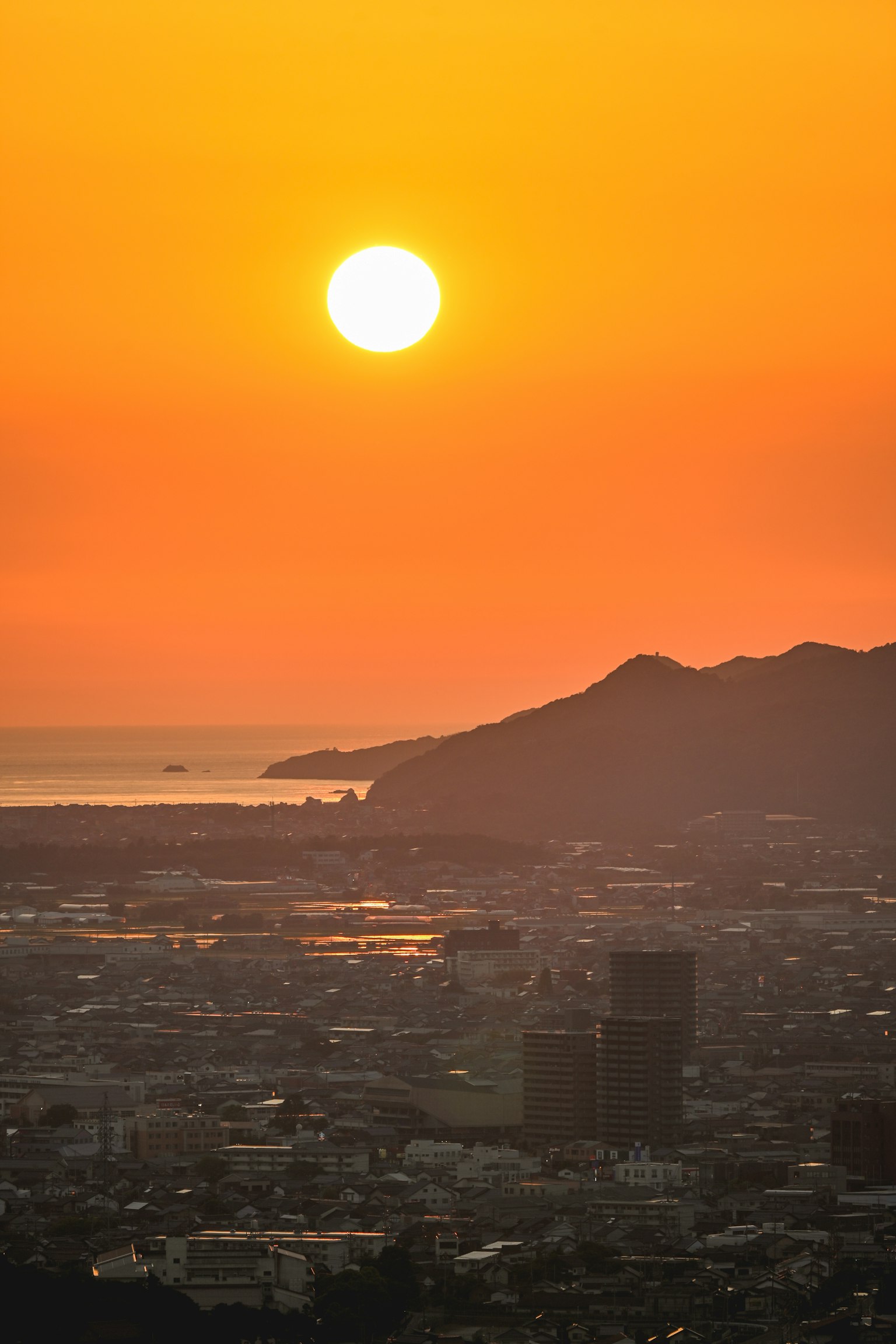 Beautiful sunset between the sea and mountains