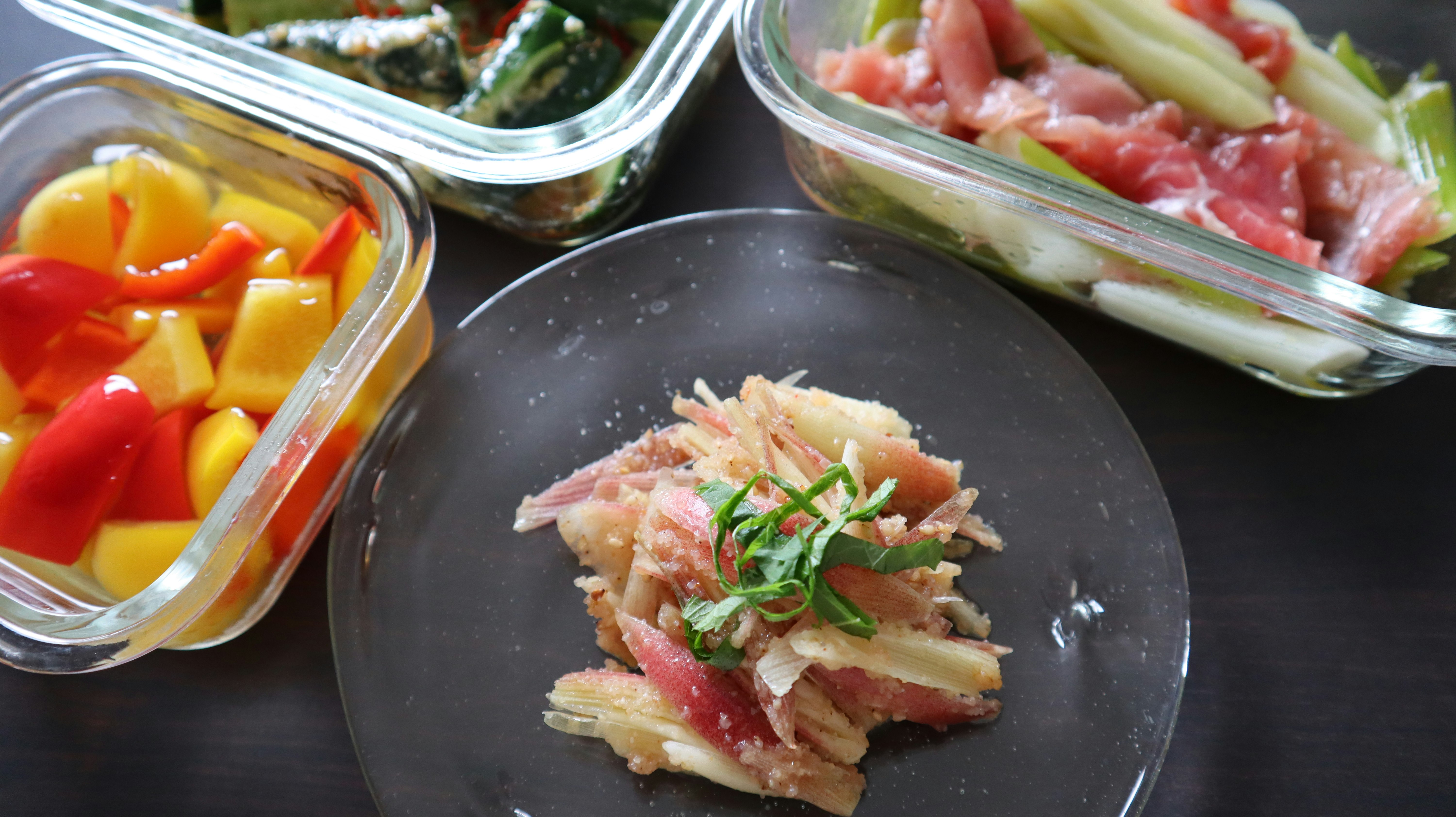 salad plating with colorful vegetable containers