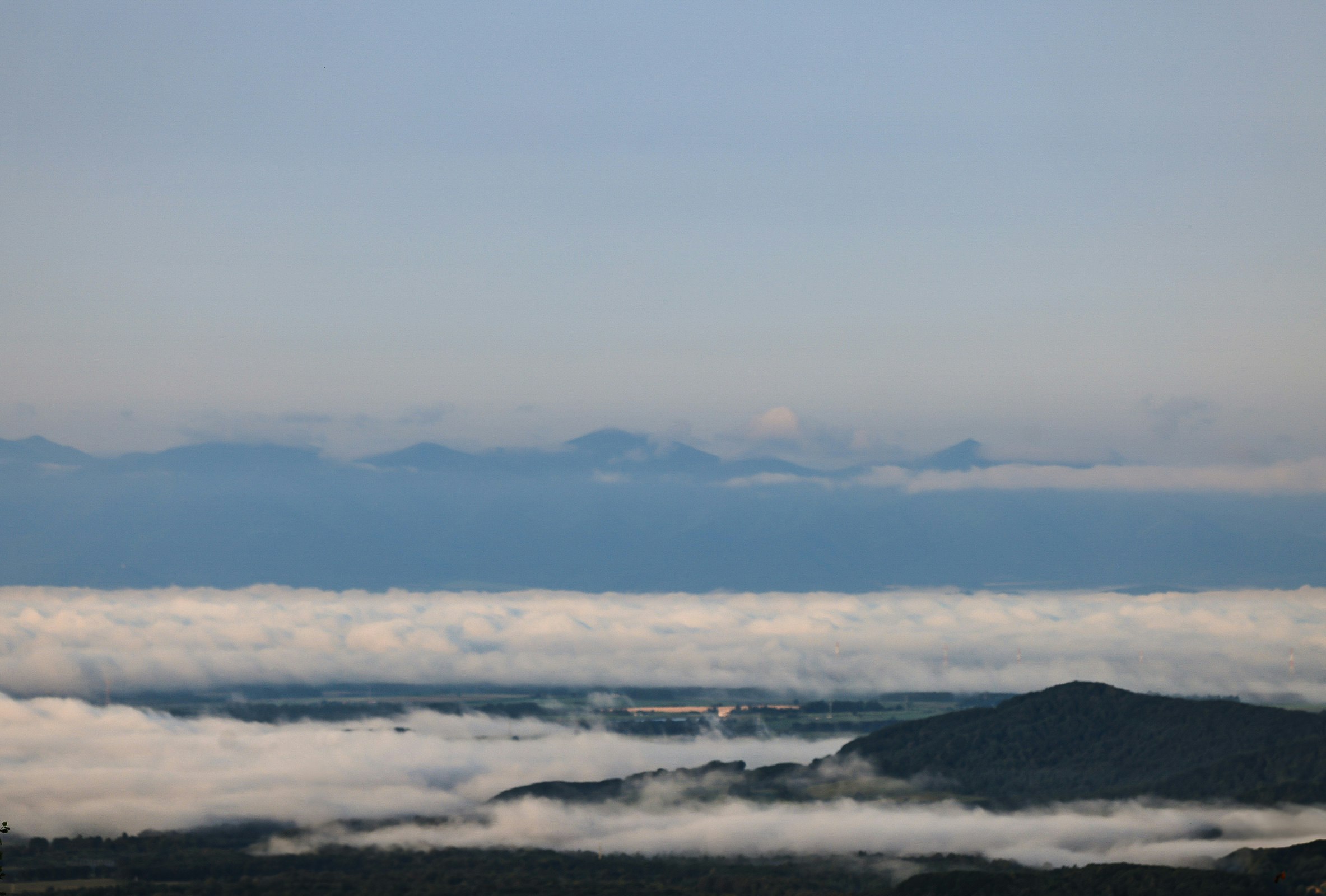morning landscape of a sea of fog and mountain ridges
