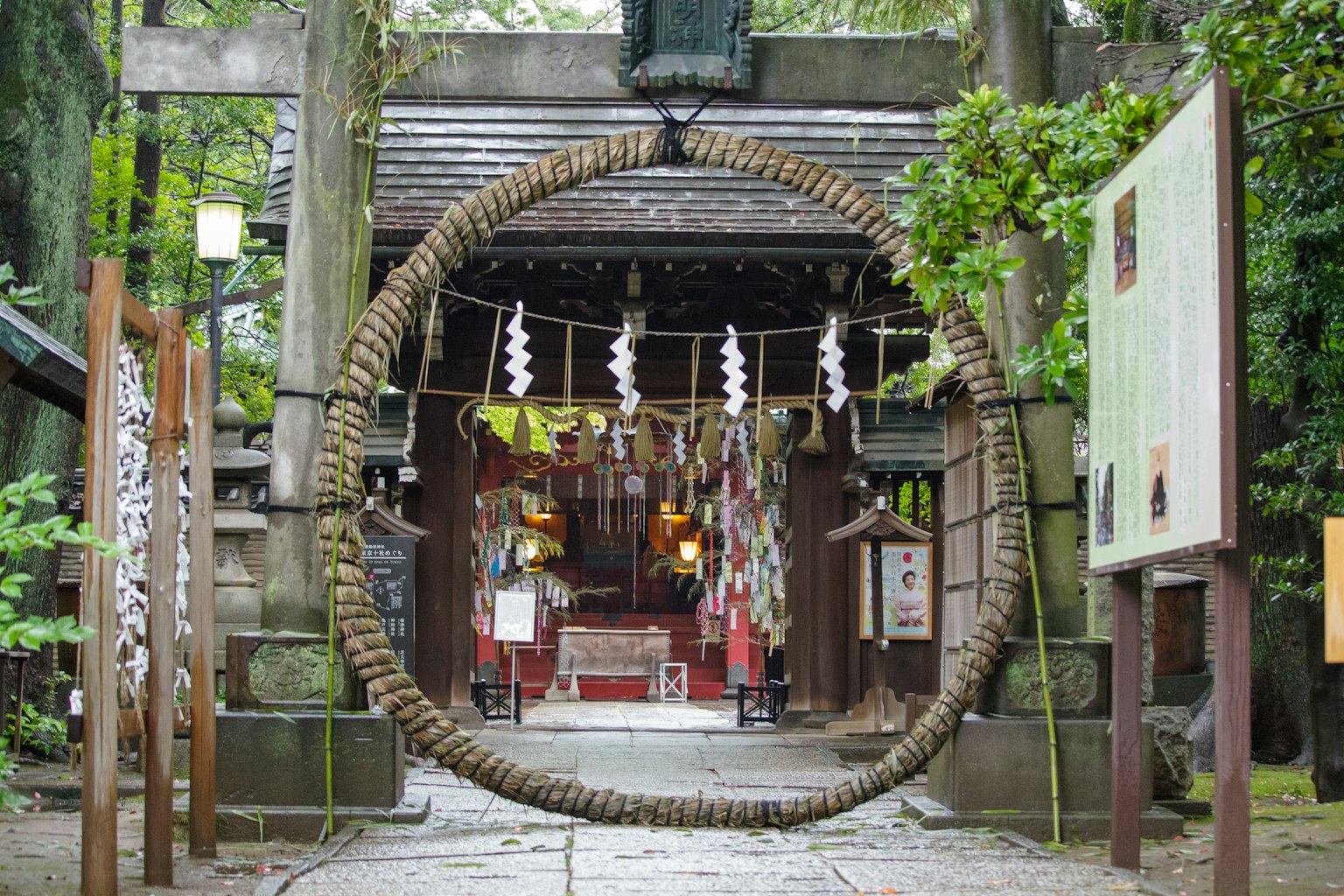 Large straw ring at the entrance of a shrine with decorations