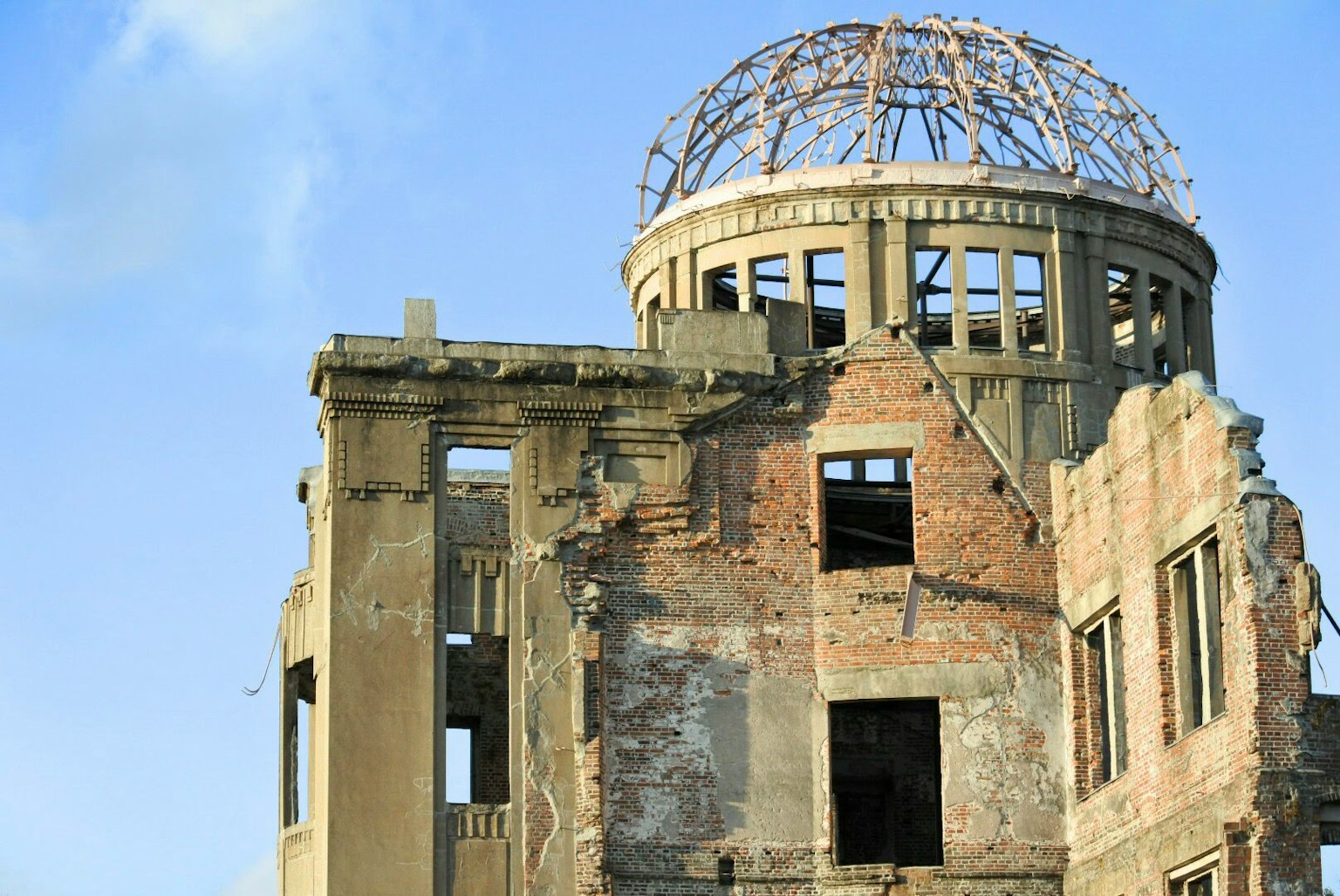 Hiroshima Peace Memorial with damaged structure and blue sky