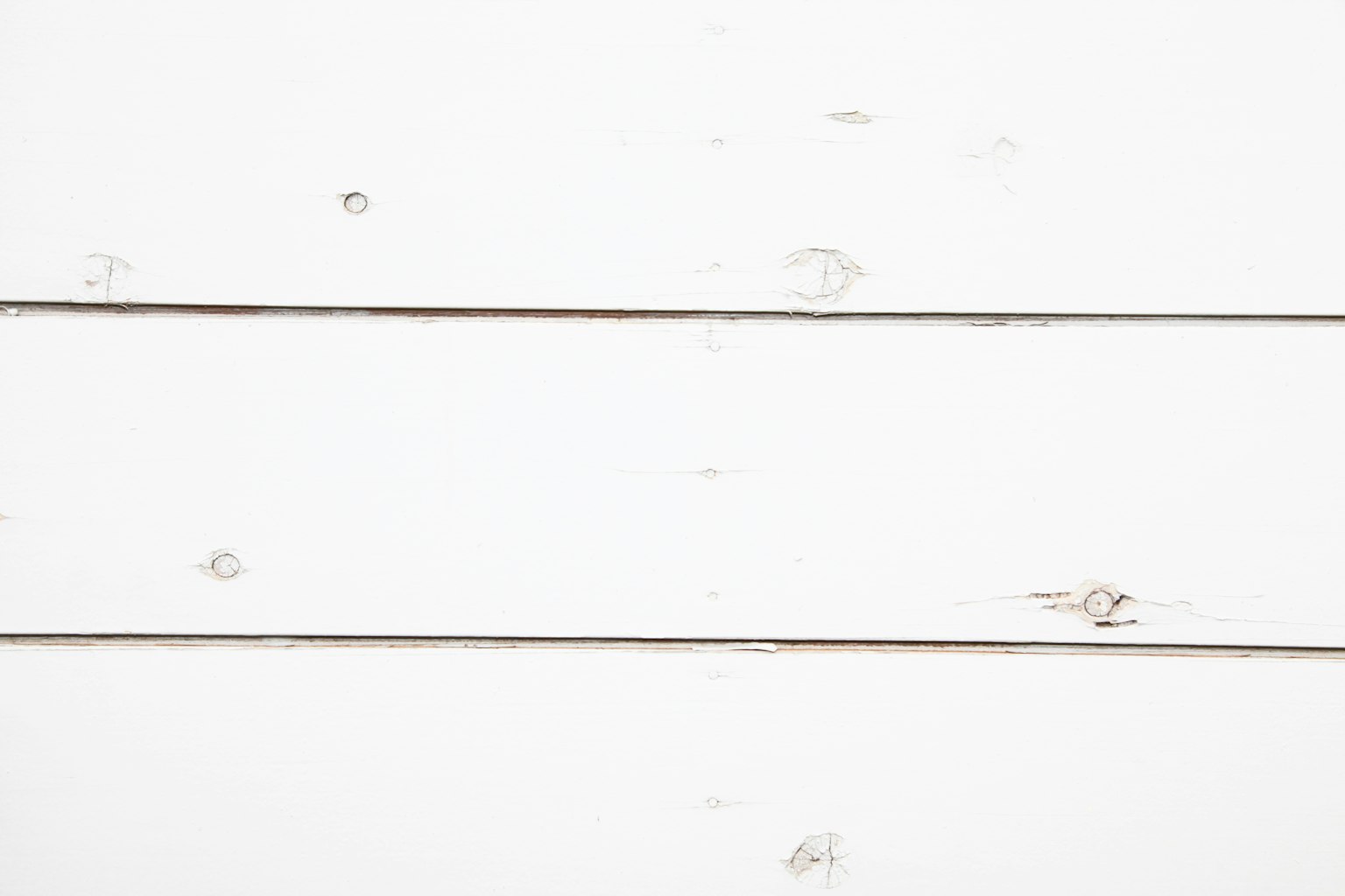 Sfondo semplice con una texture di tavole di legno bianche