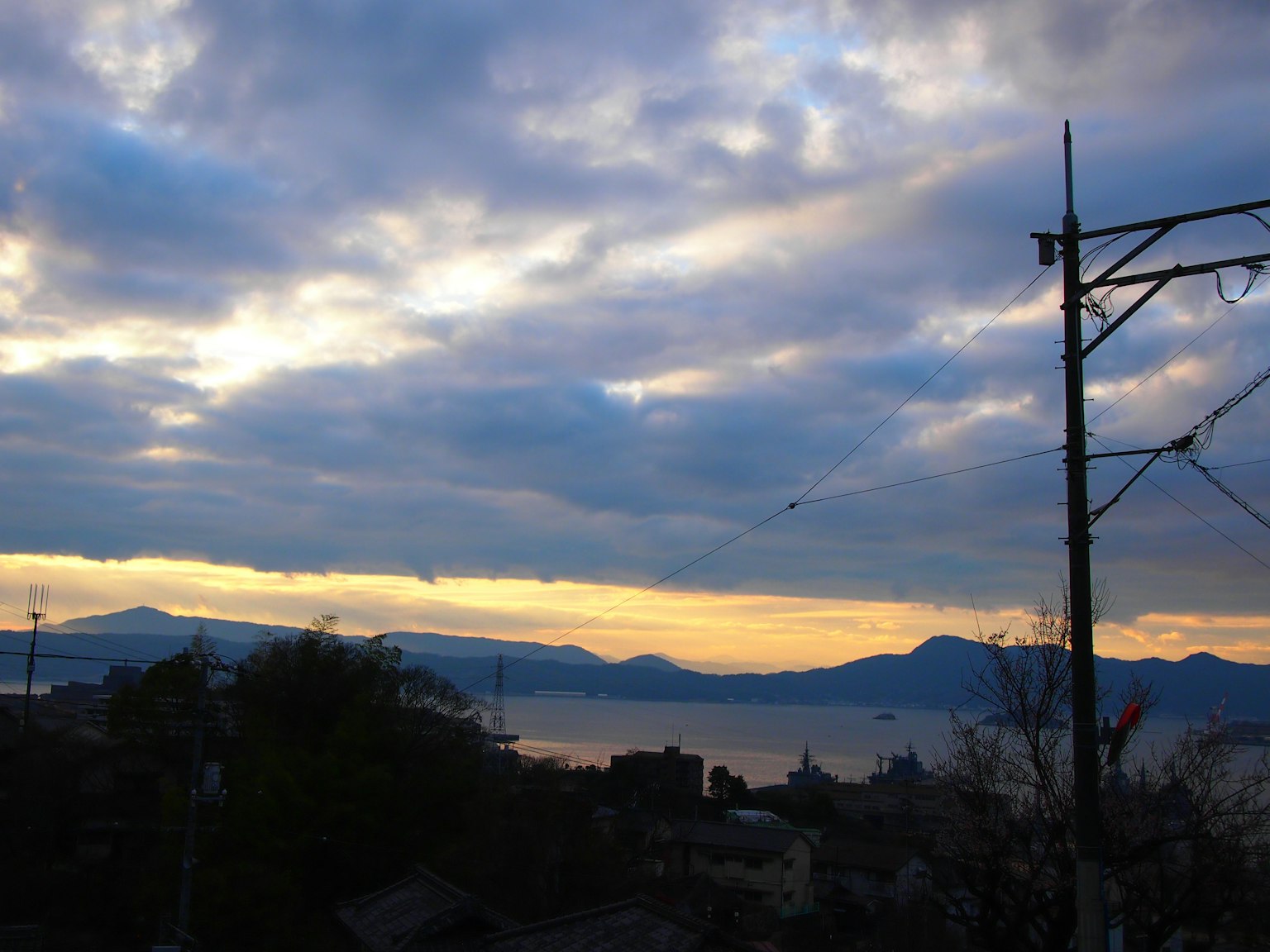 Scenic view of a sunset sky with mountains in the background