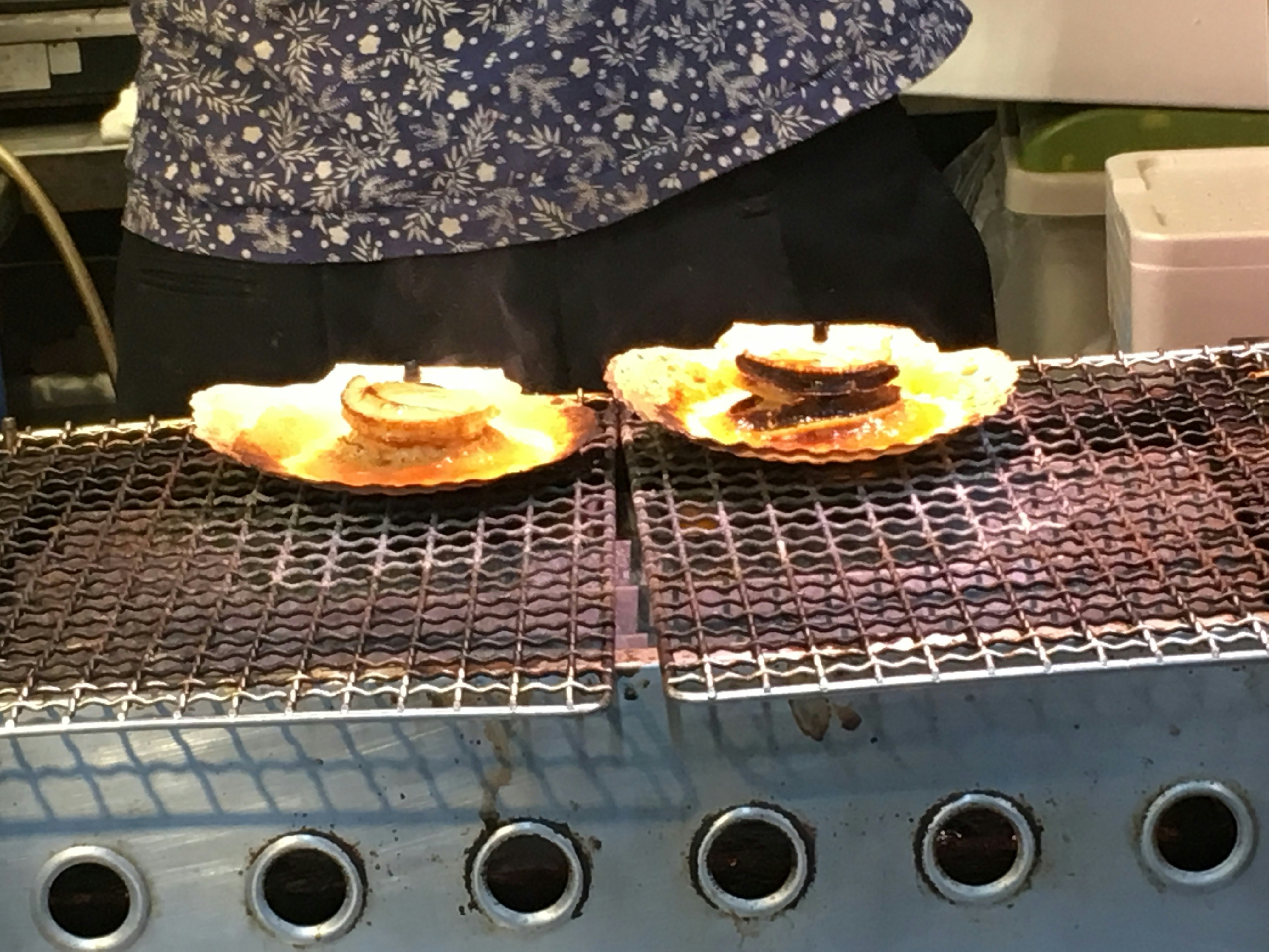 hot sandwiches grilling on a wire rack