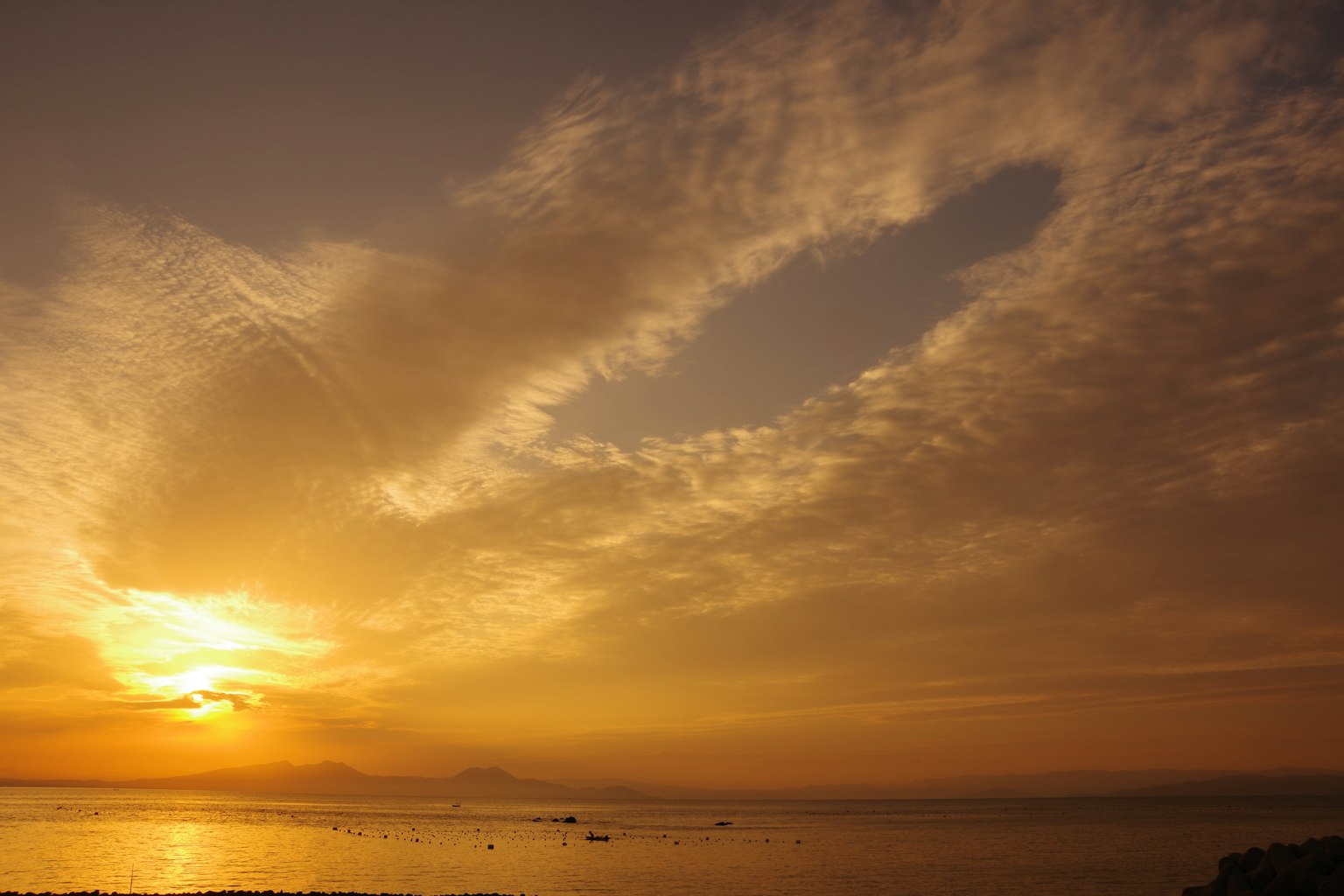 Beautiful sunset over the sea with cloud formations