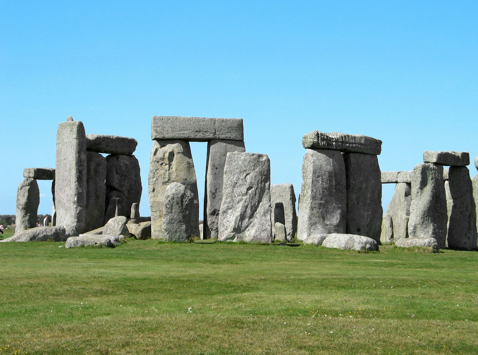 Stonehenge stone structure with clear blue sky