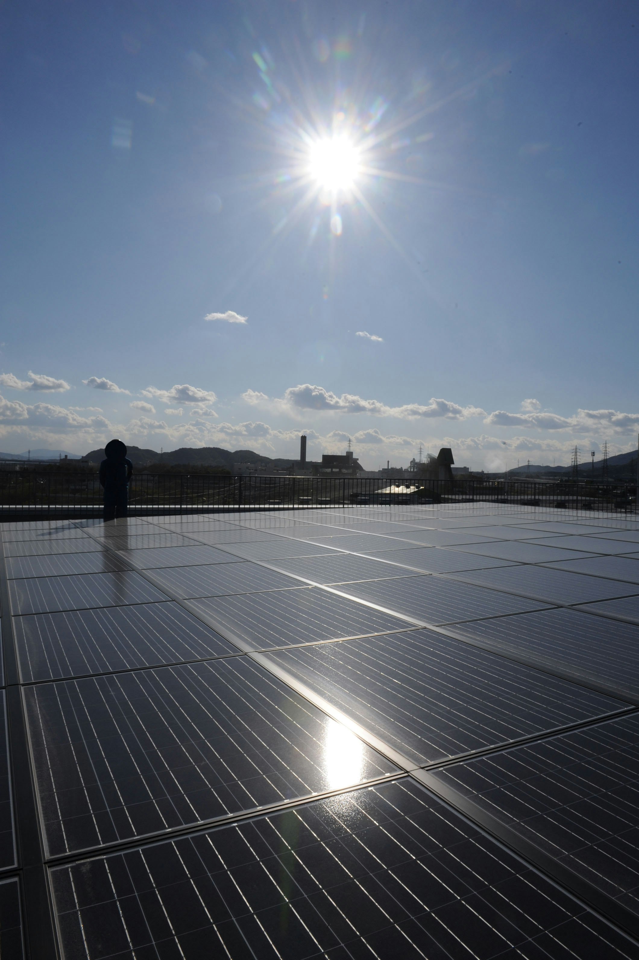 Outdoor solar panels array with a bright blue sky